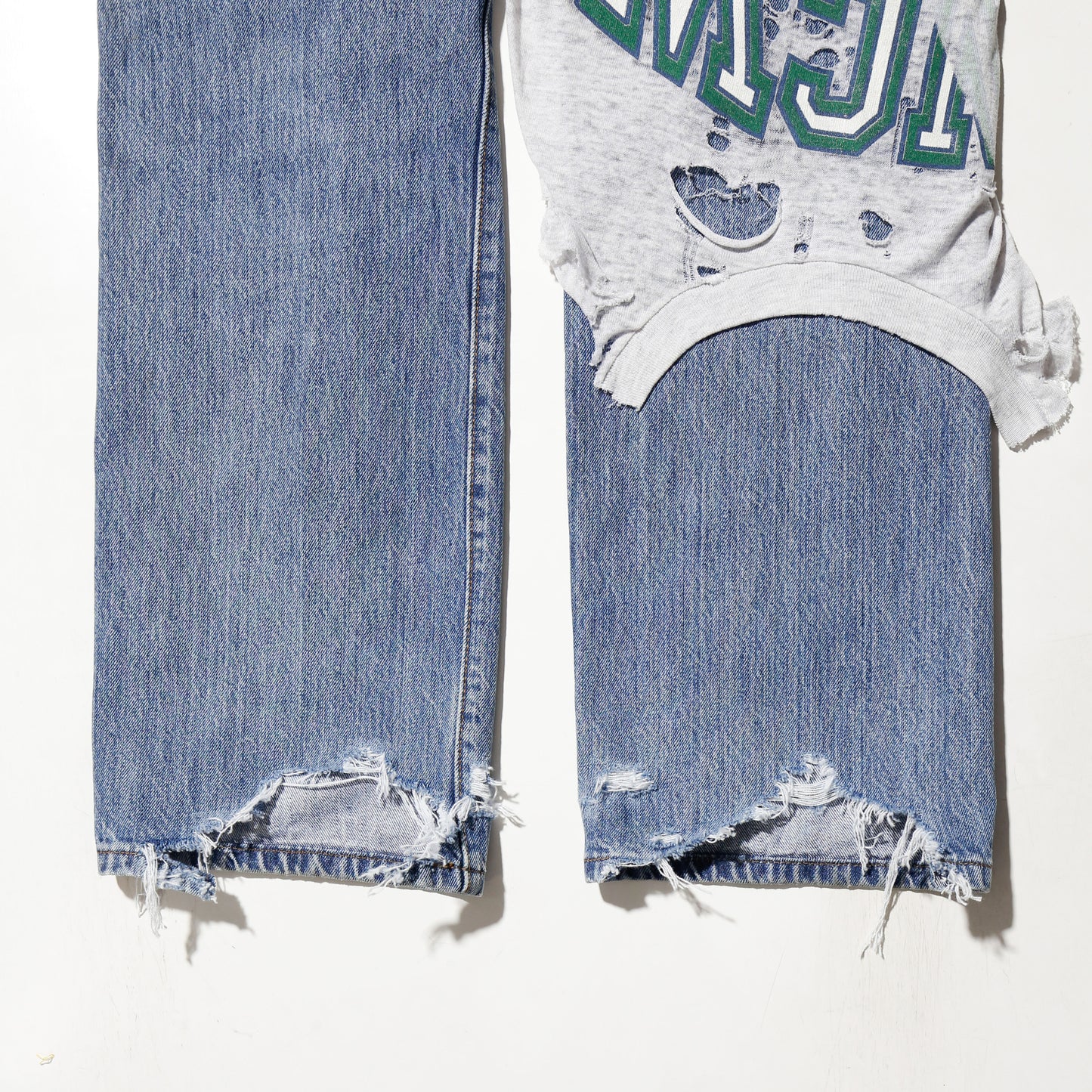 *one-off broken layered jeans