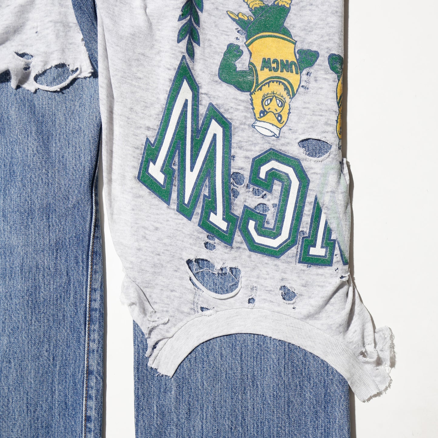 *one-off broken layered jeans