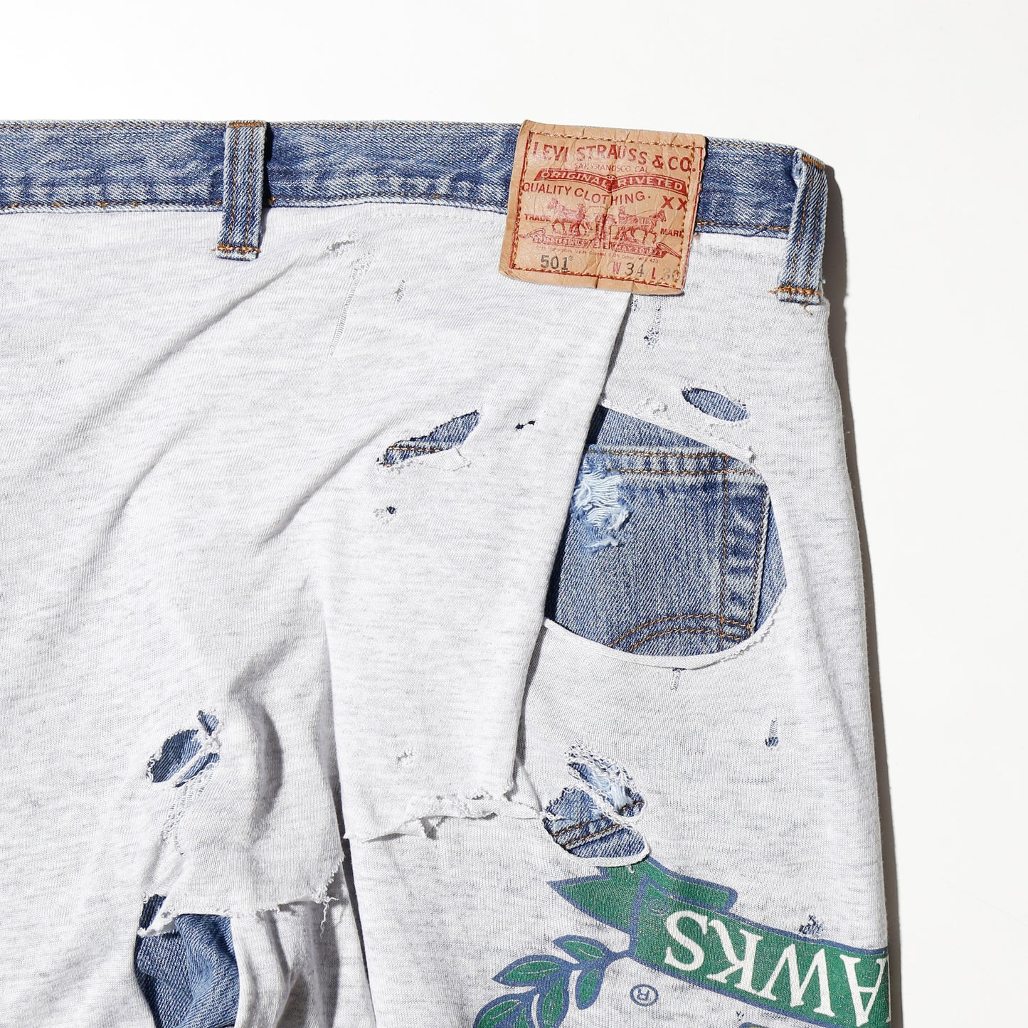 *one-off broken layered jeans