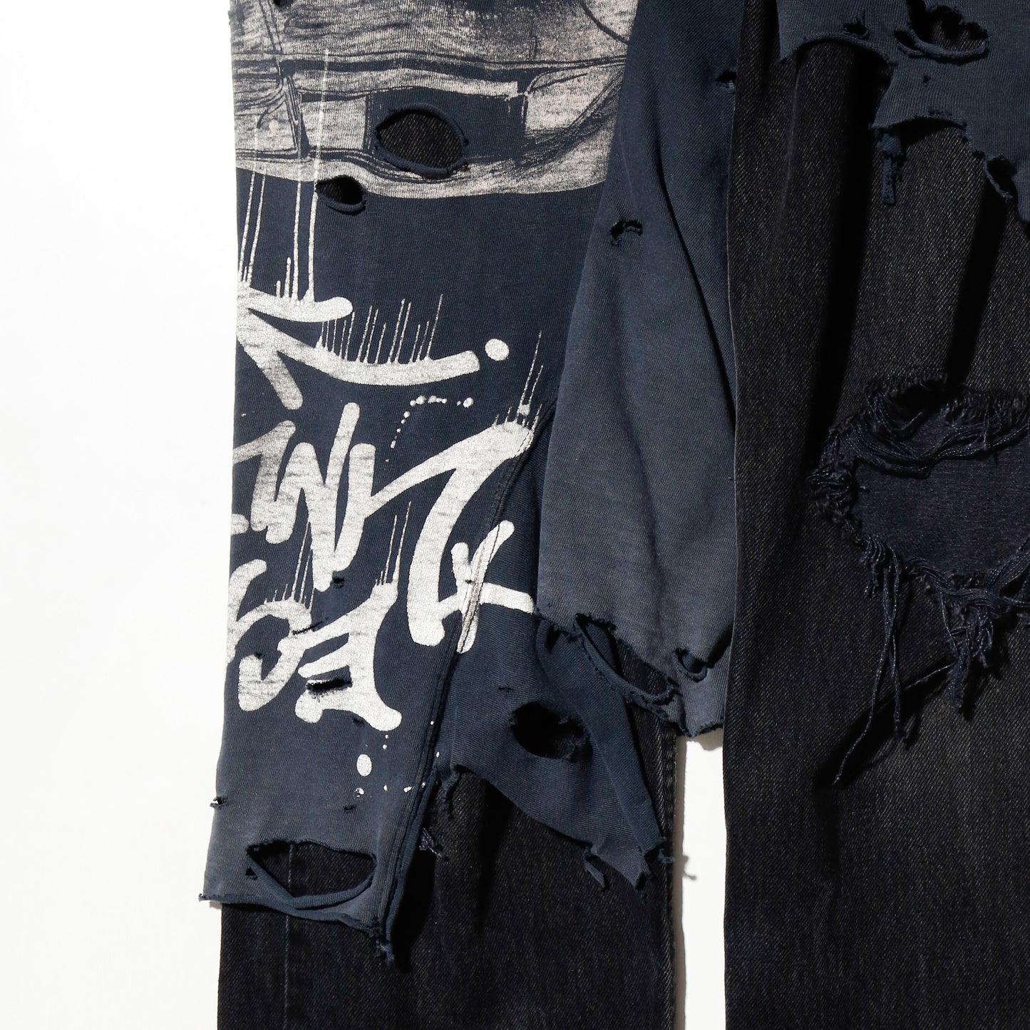 *one-off broken layered jeans