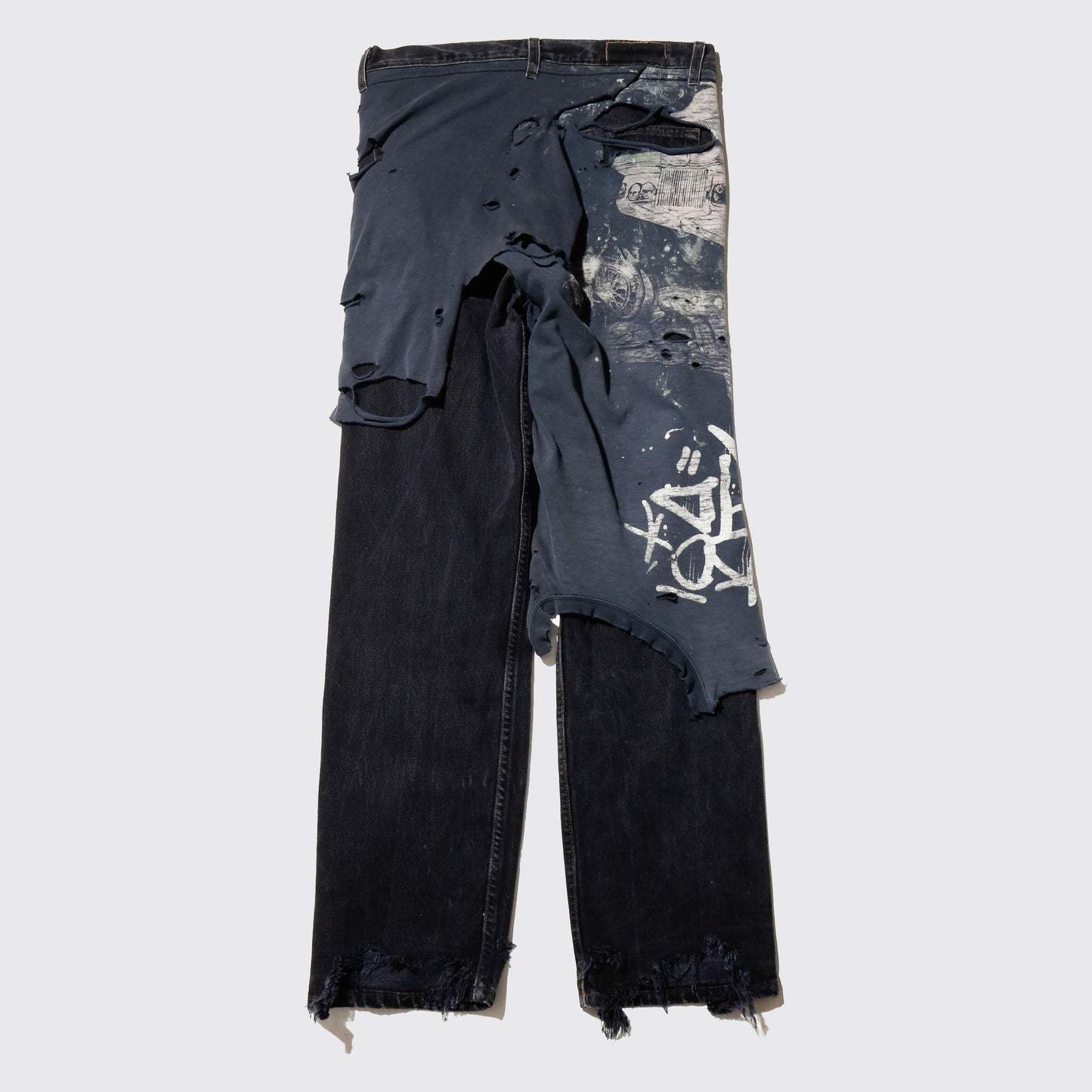 *one-off broken layered jeans