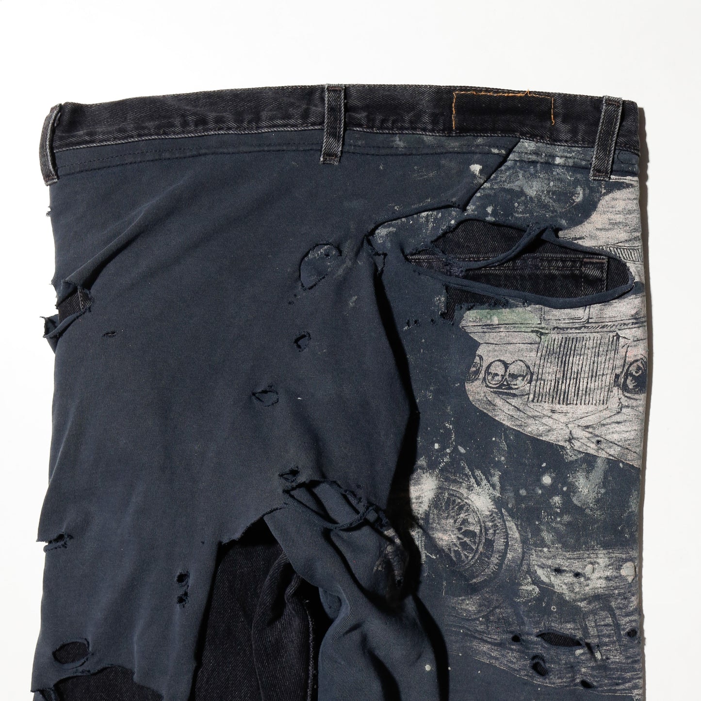 *one-off broken layered jeans