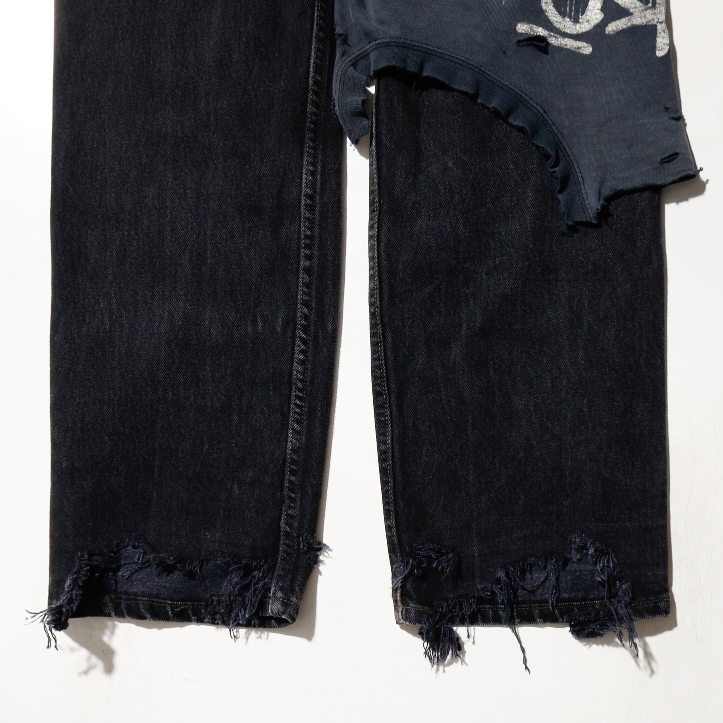 *one-off broken layered jeans