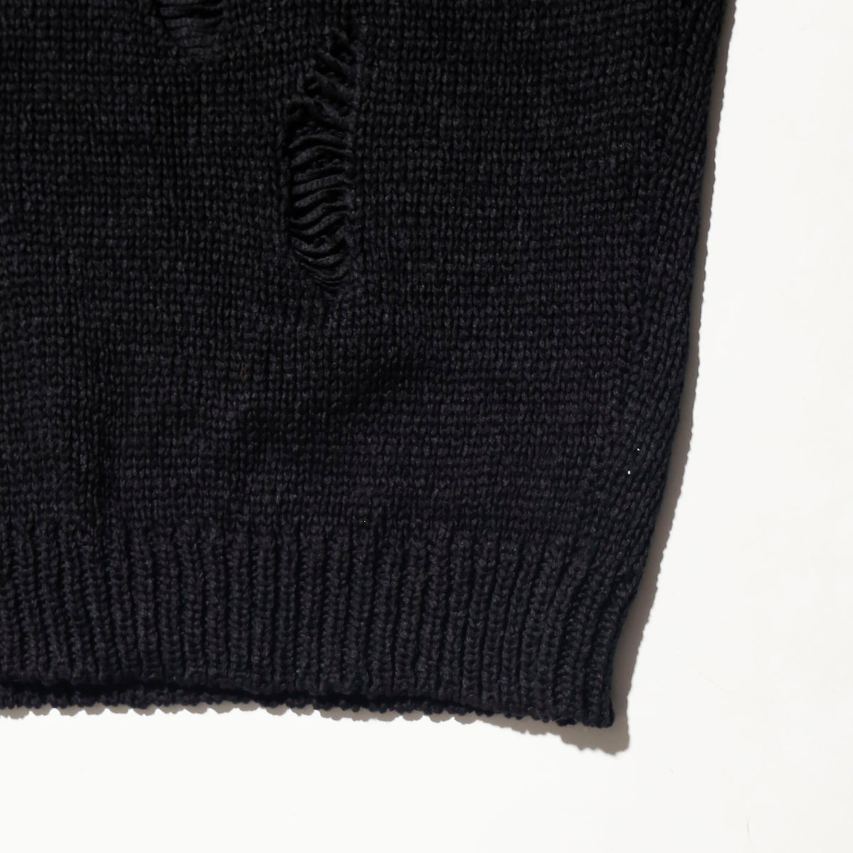 vintage slanting snap broken sweater