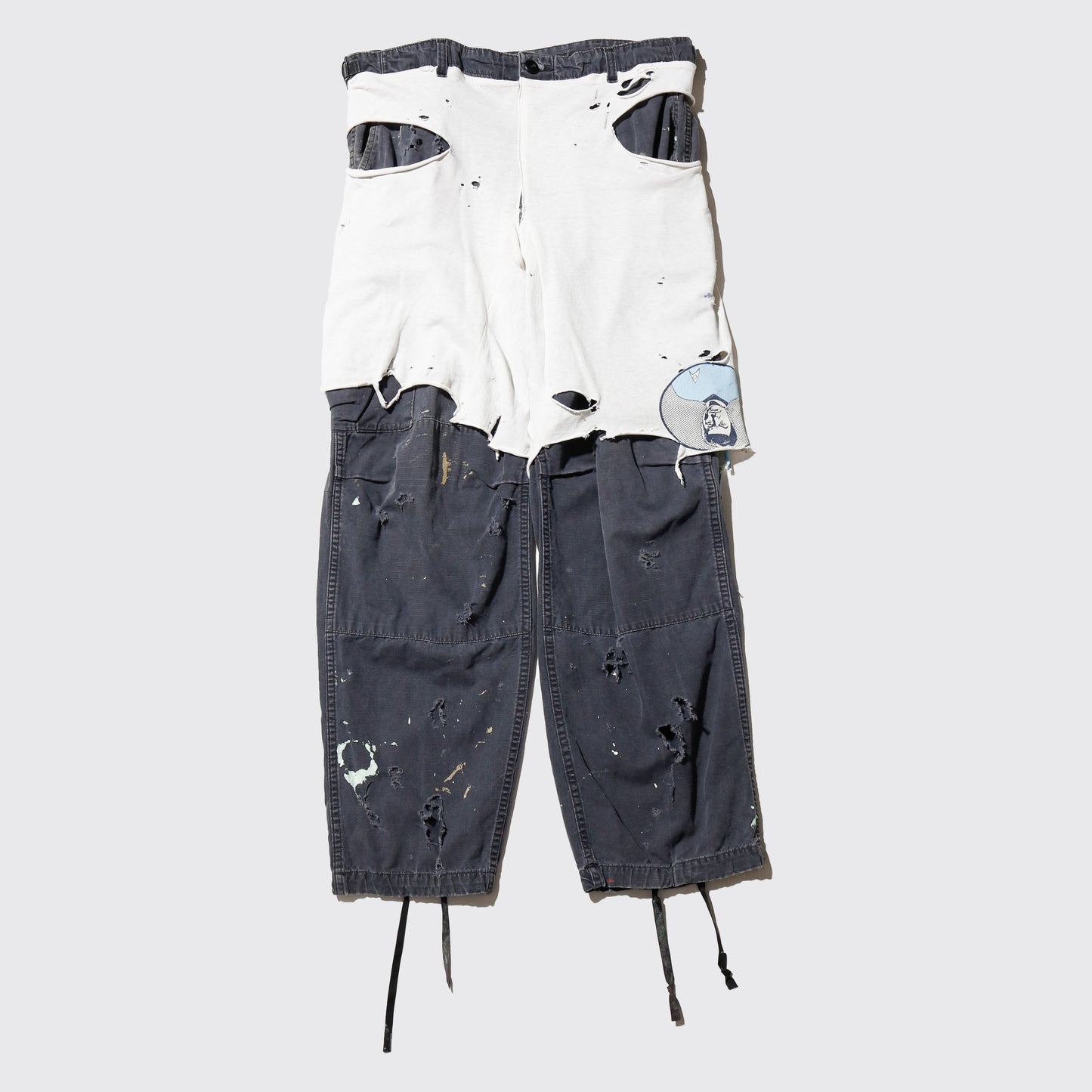 *one-off broken layered trousers