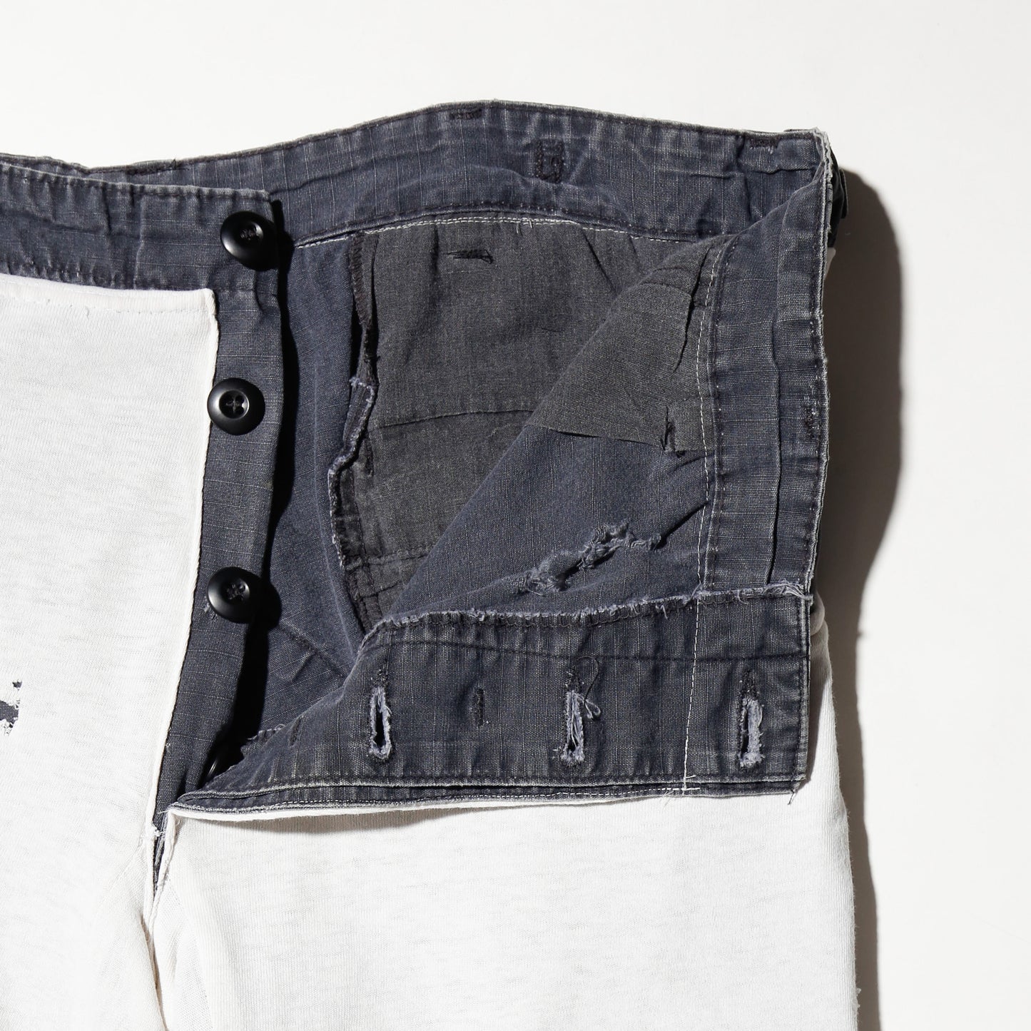 *one-off broken layered trousers