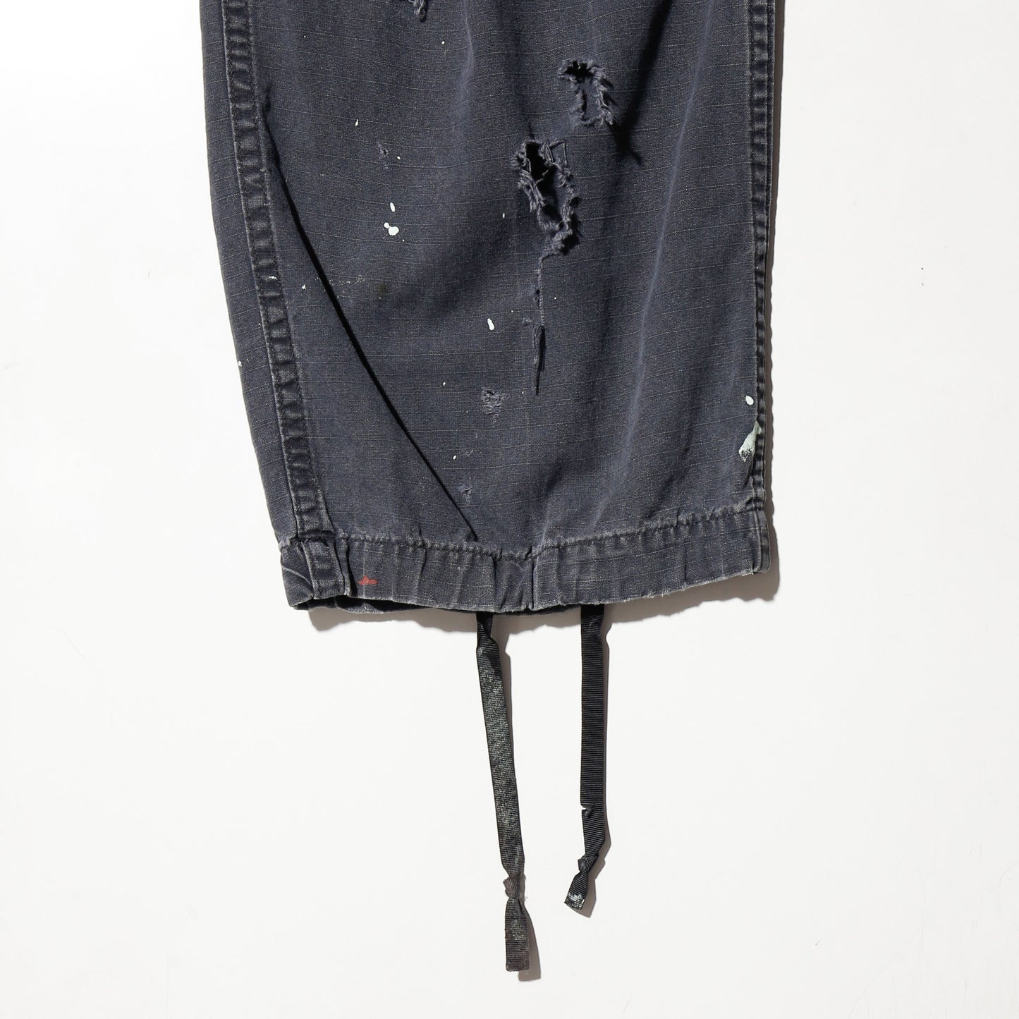 *one-off broken layered trousers