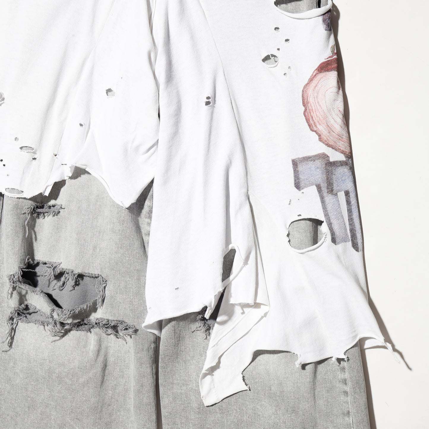 *one-off broken layered jeans