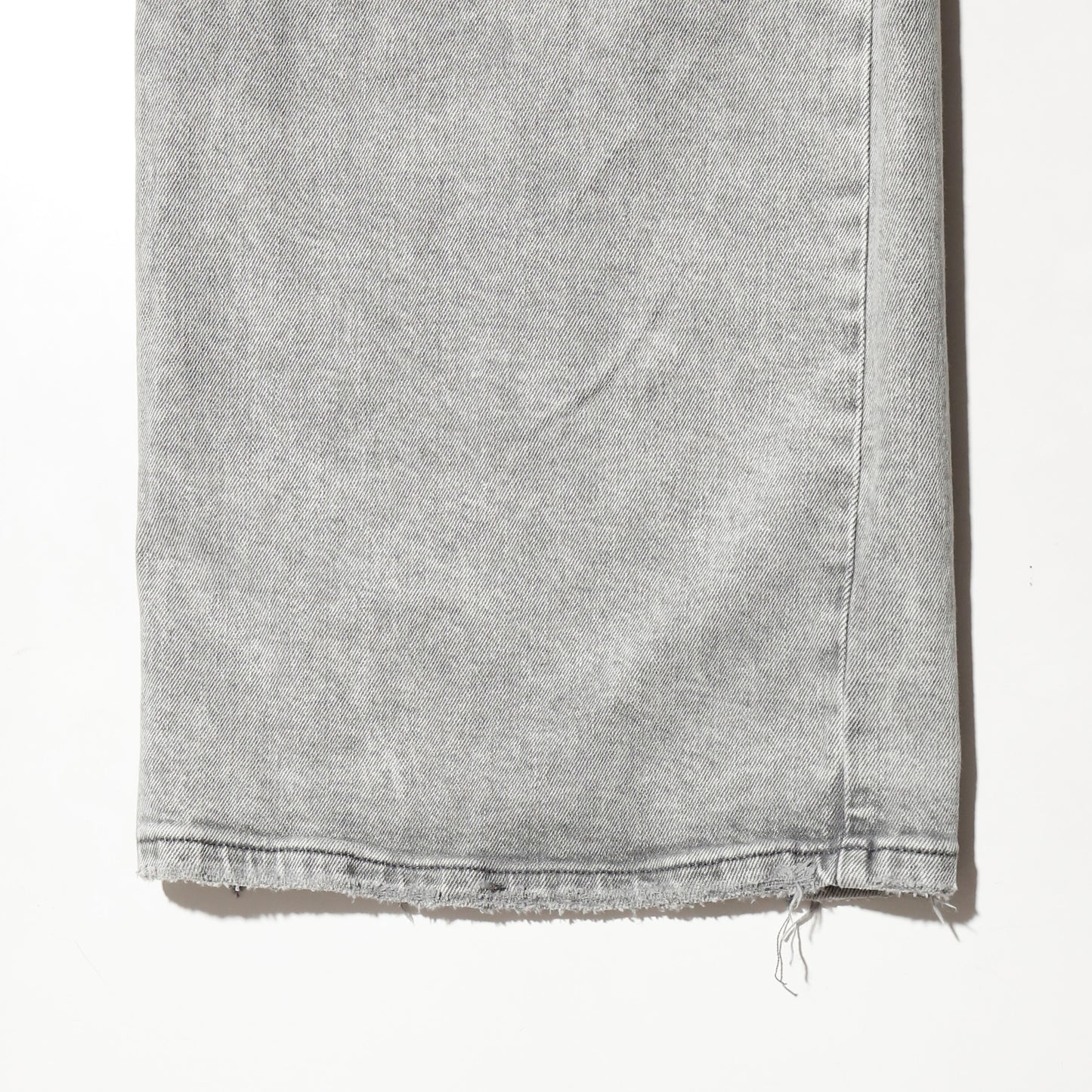 *one-off broken layered jeans