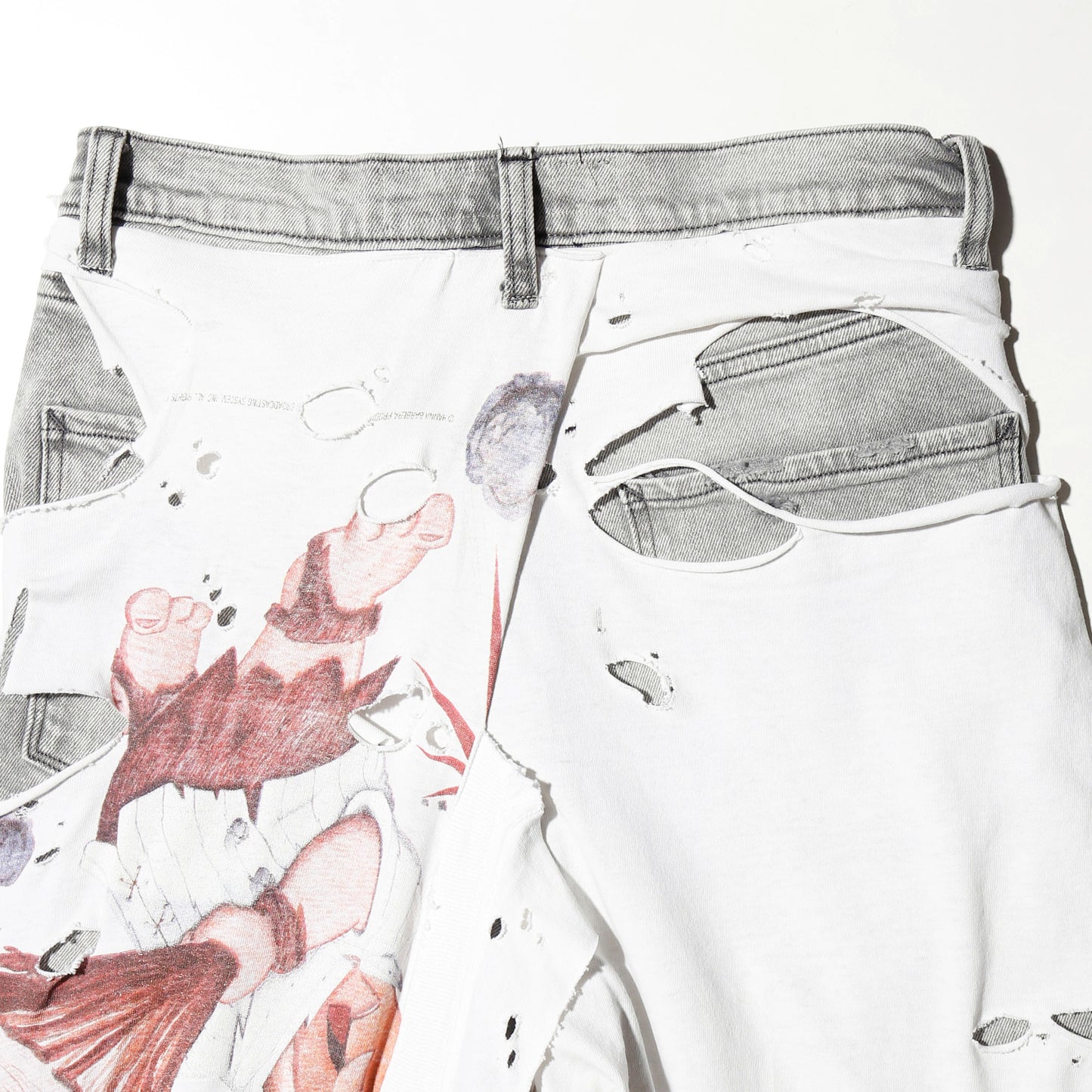 *one-off broken layered jeans