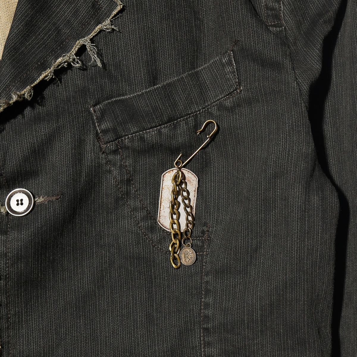 vintage distressed cropped jacket, with dogtag pins