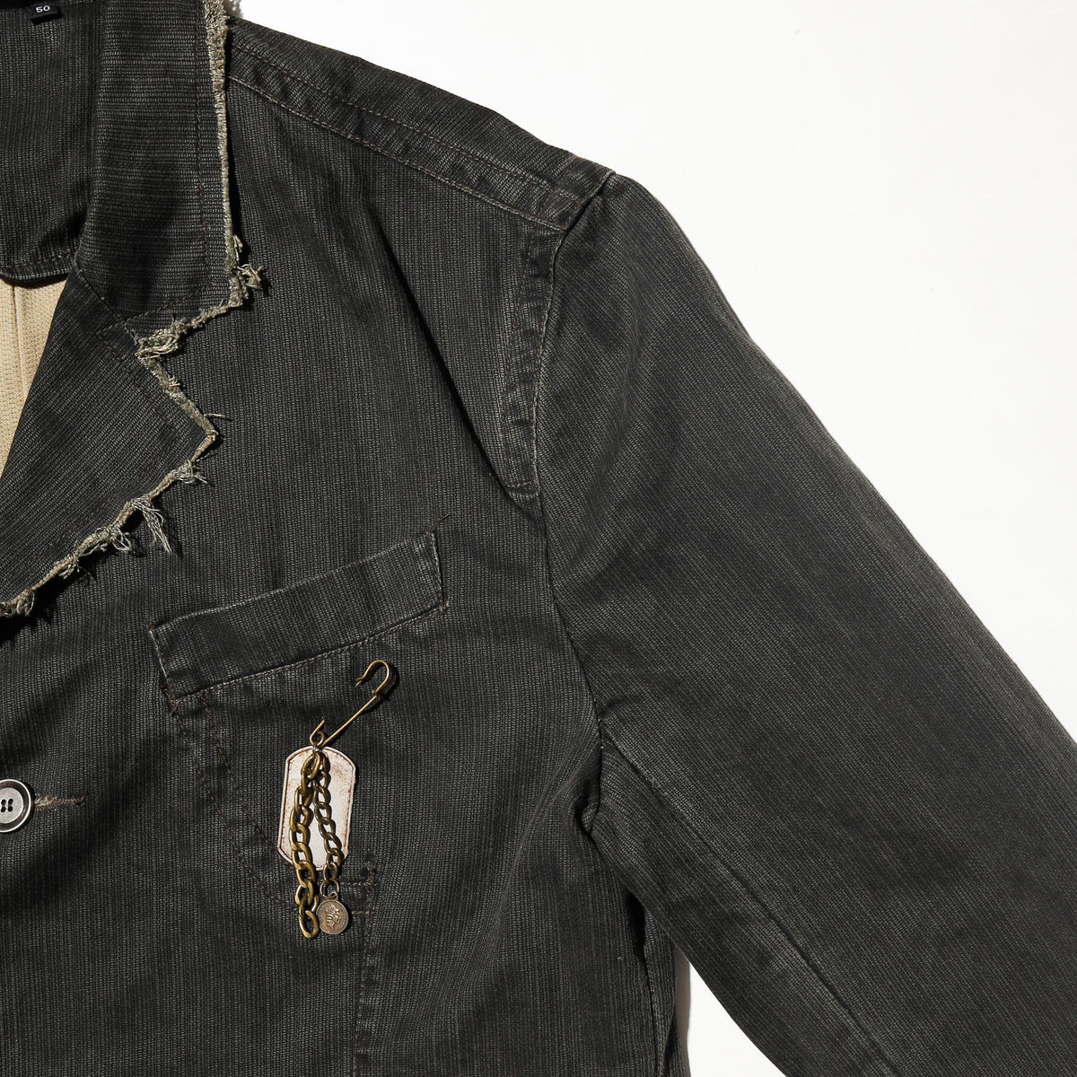 vintage distressed cropped jacket, with dogtag pins
