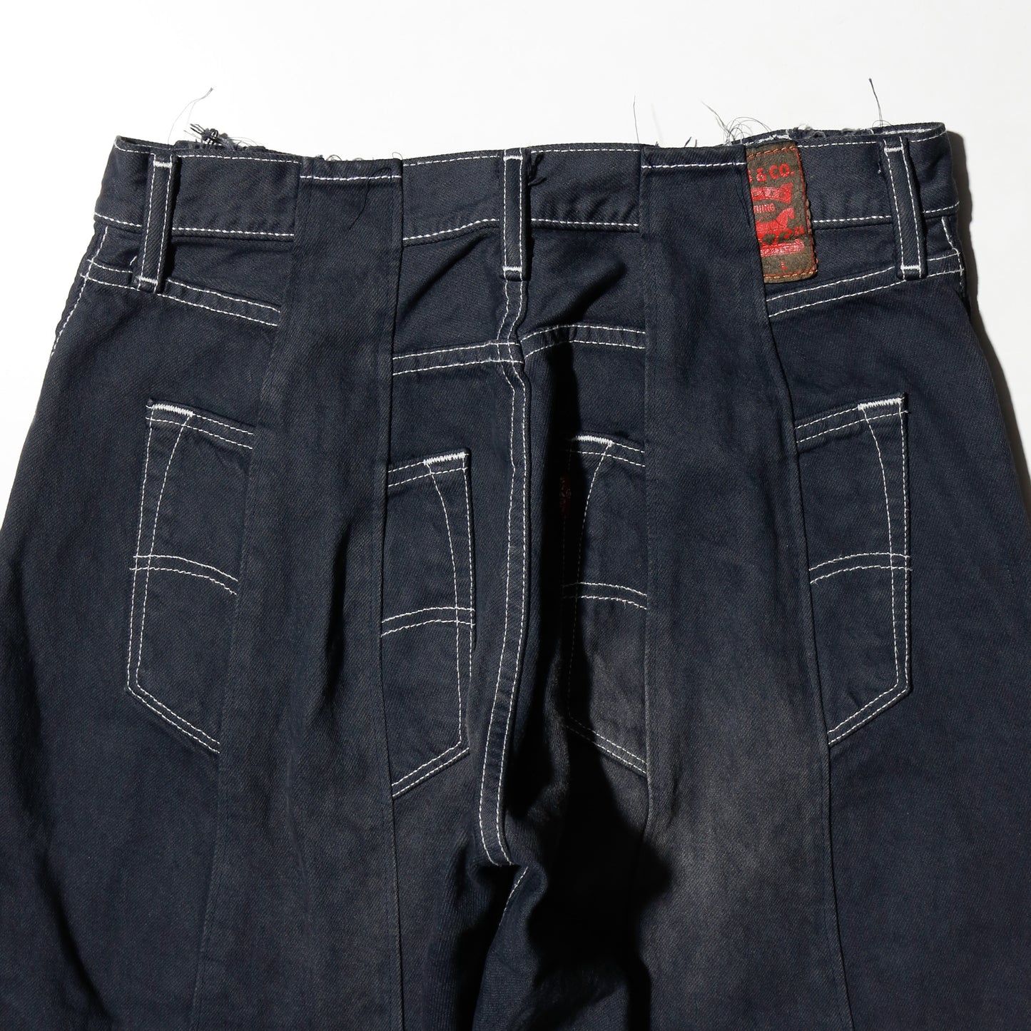 *one-off upside down baggy jeans: model-fade finish