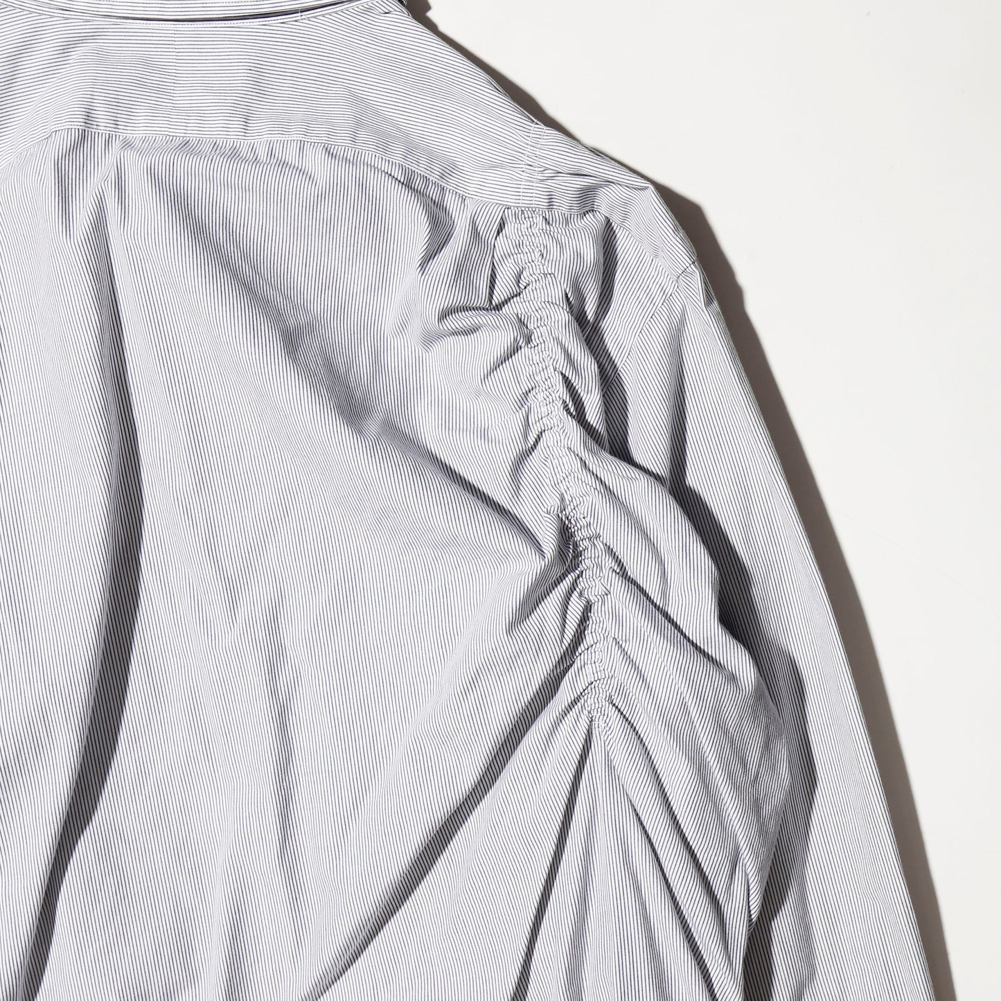 *one-off irregular gathering shirt