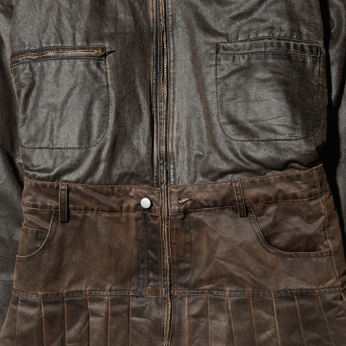 *one-off hybrid pleats dust jacket