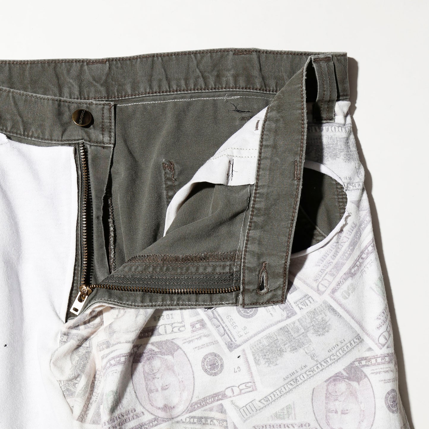 *one-off broken layered trousers