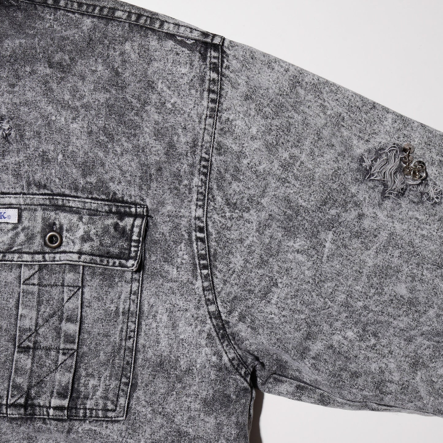 vintage studs broken trucker shirt