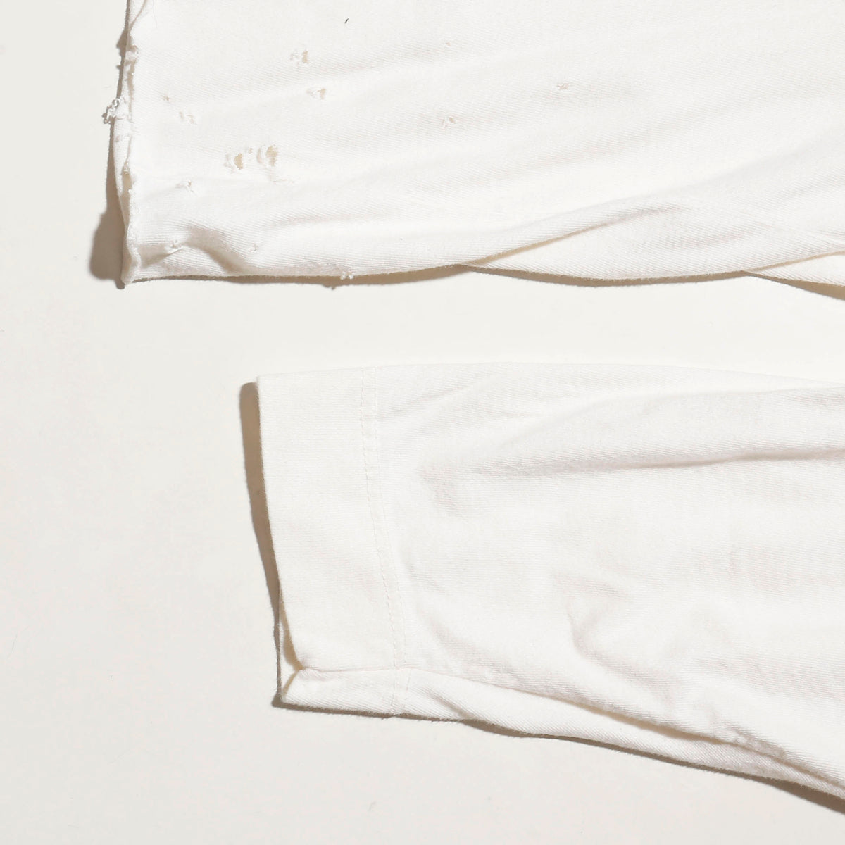 *one-off perry ellis broken cut sew