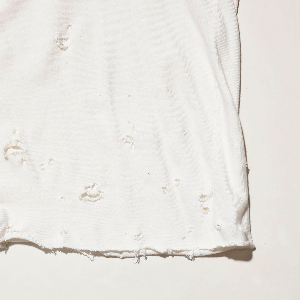 *one-off perry ellis broken cut sew