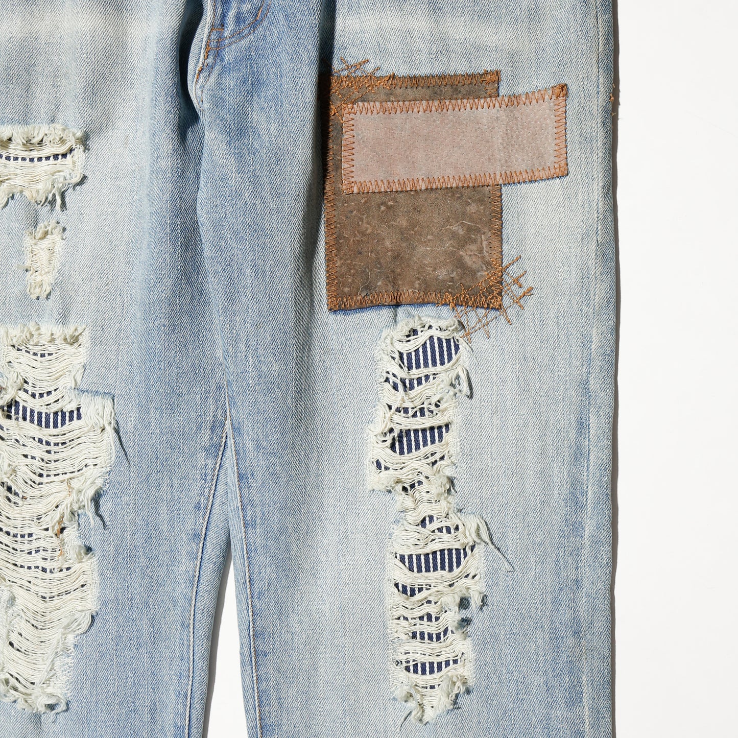 *one-off repaired flare jeans