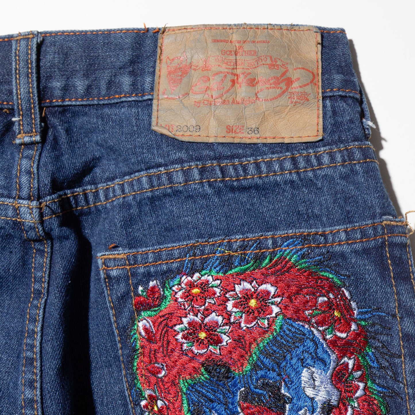 vintage ed hardy painted cross baggy jeans