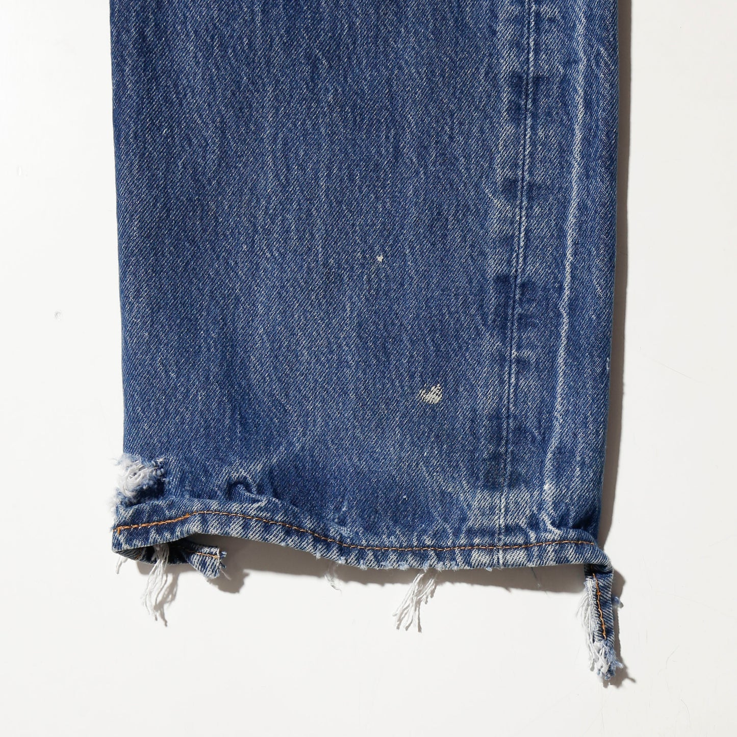 *one-off broken layered jeans