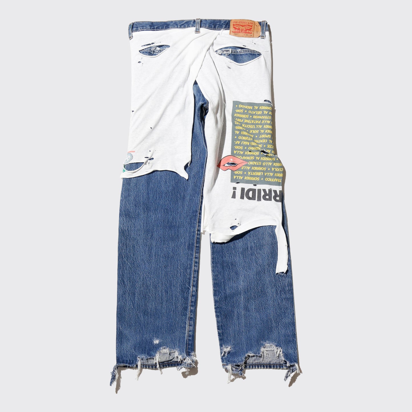 *one-off broken layered jeans