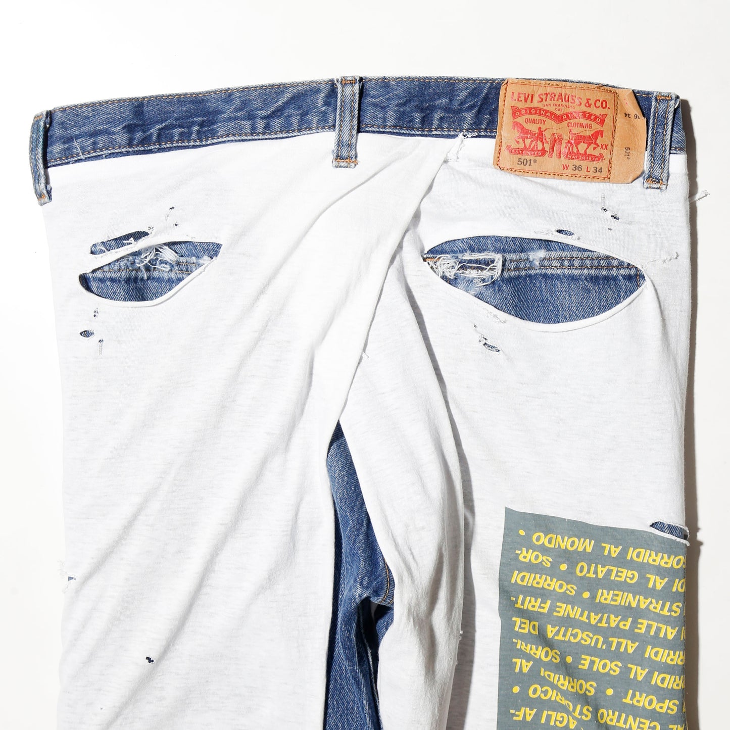 *one-off broken layered jeans