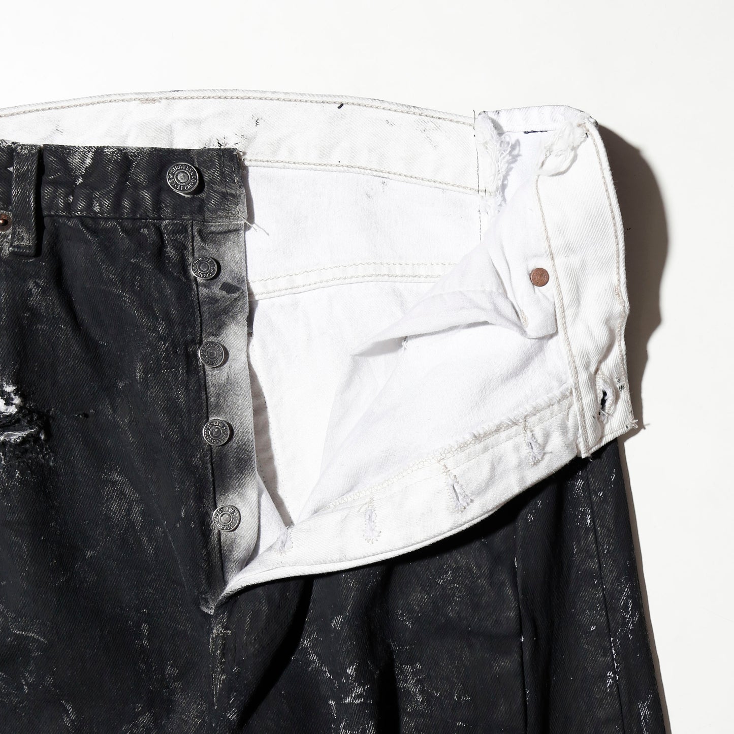 *one-off broken upside down jeans: model- dust black