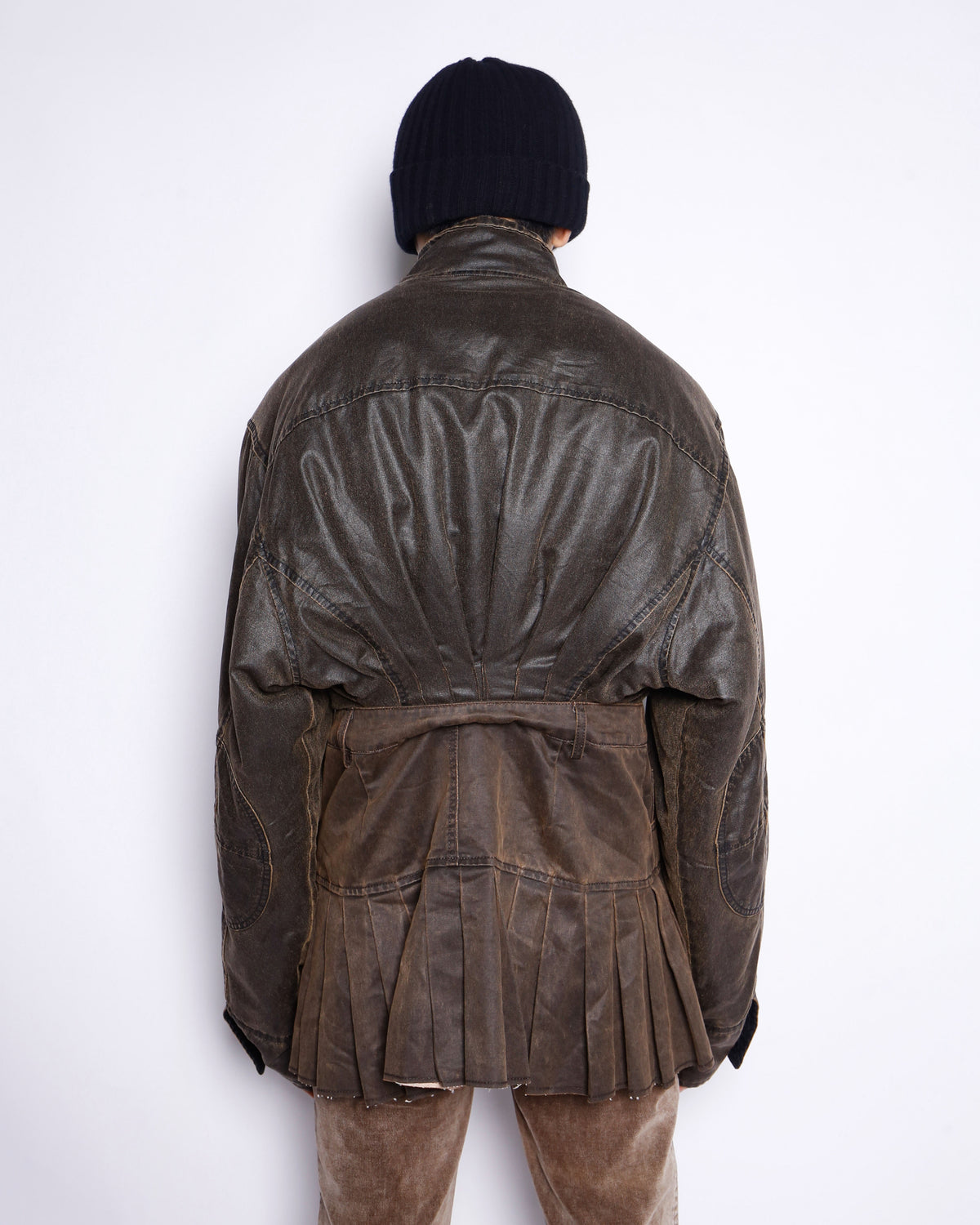 *one-off hybrid pleats dust jacket