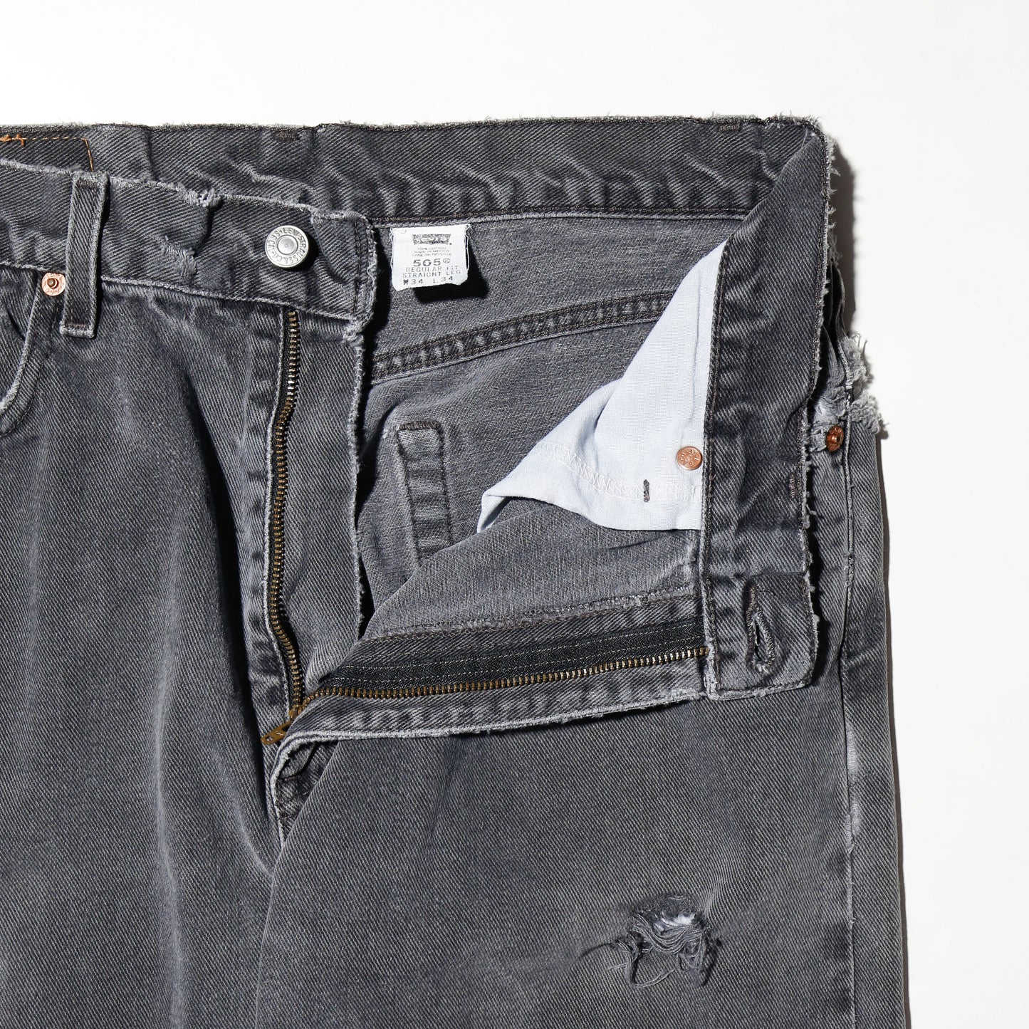 *one-off 90's levi's 505 broken jeans