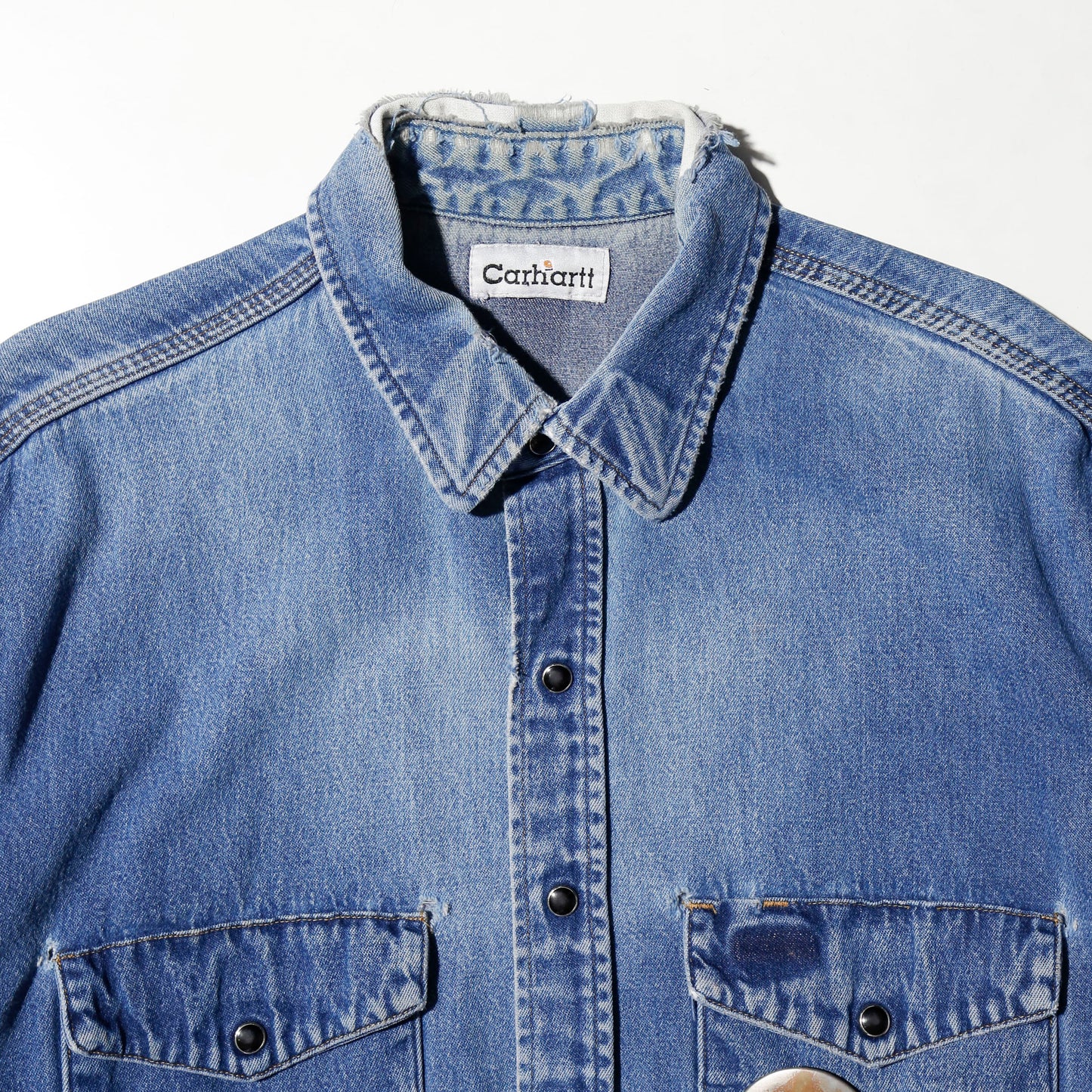 *one-off carhartt broken denim shirt,with copper badge