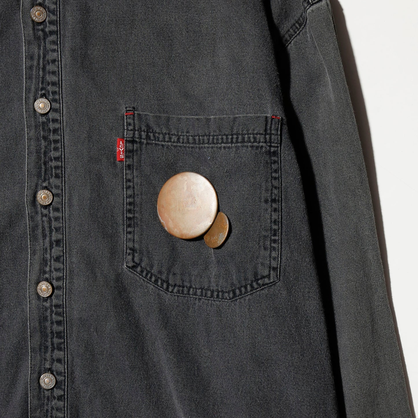 *one-off 90's levi's broken denim shirt, with copper badge