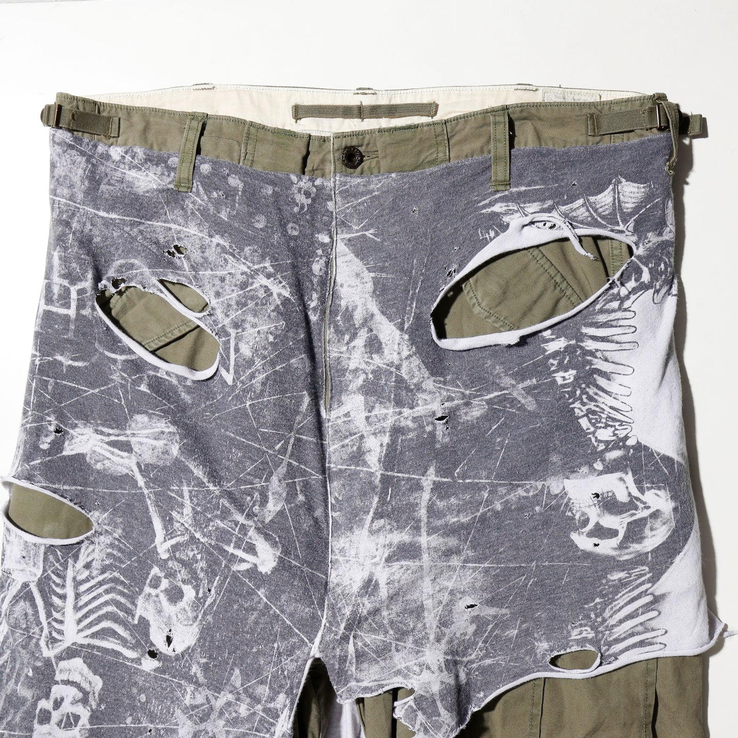 *one-off broken layered trousers