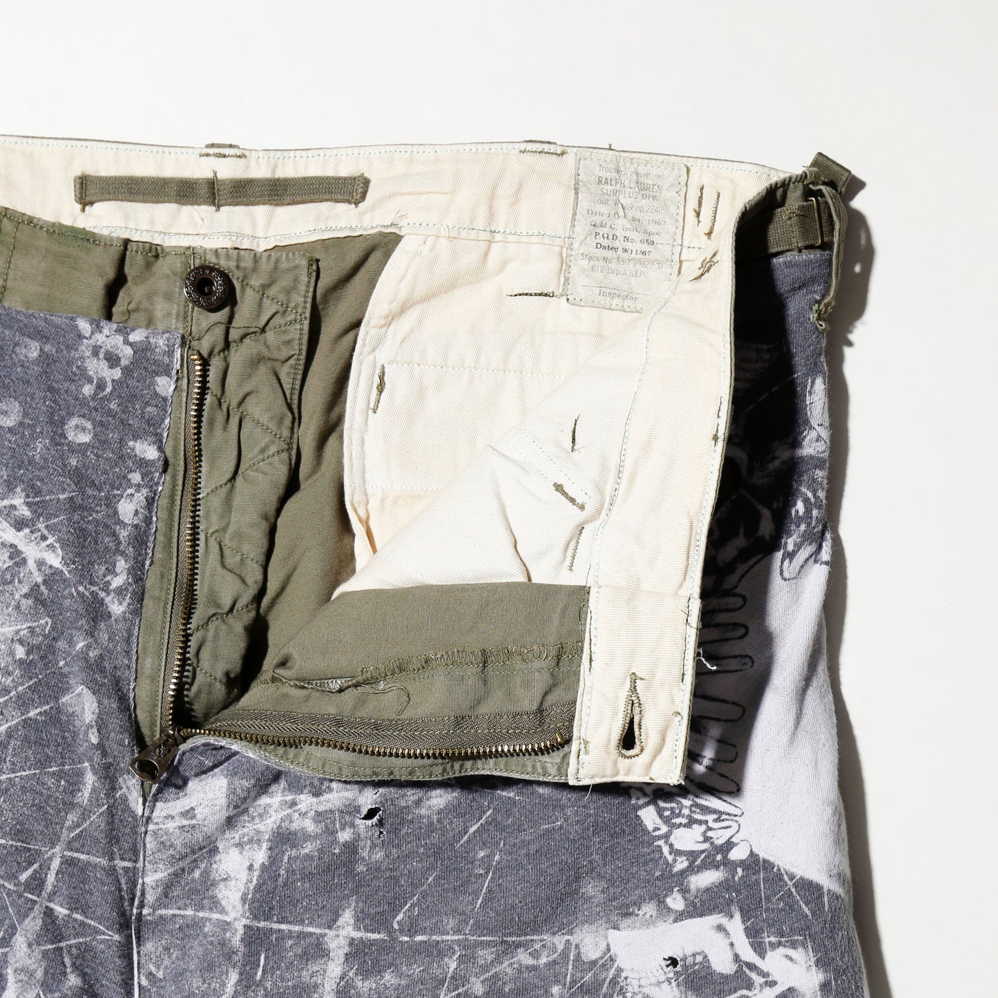 *one-off broken layered trousers