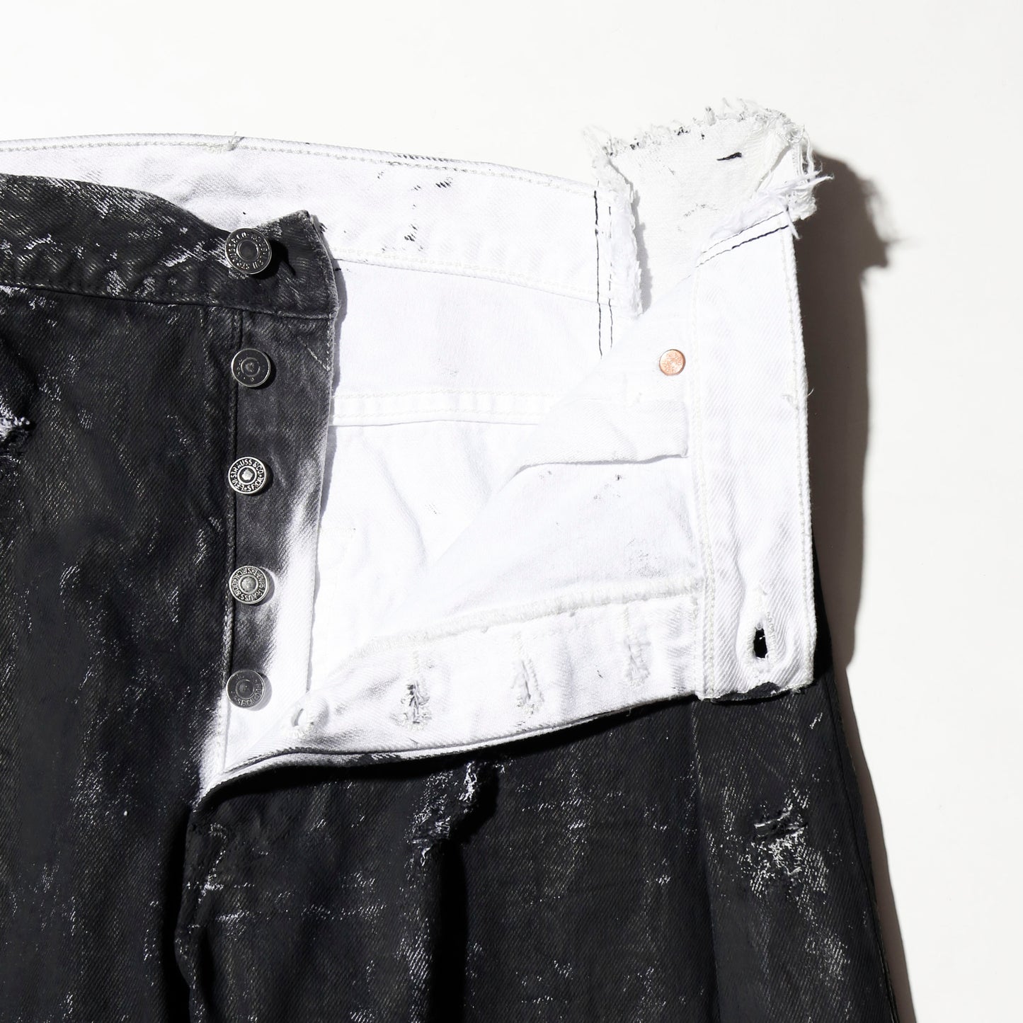 *one-off broken upside down jeans: model- dust black