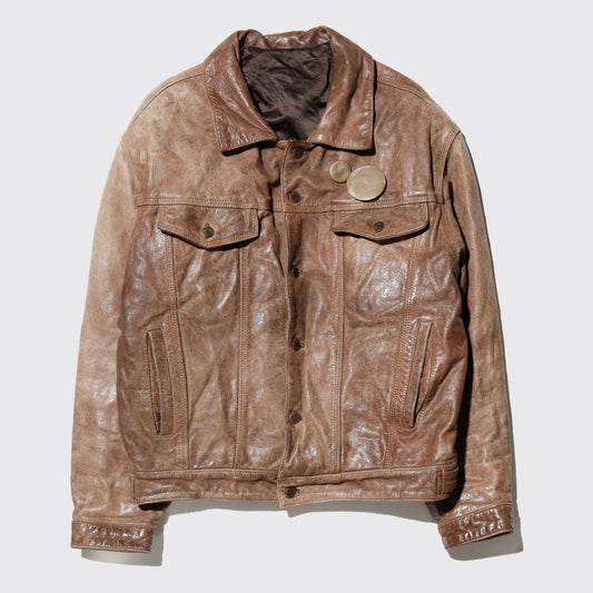 vintage faded leather trucker jacket , with aging kapper badge