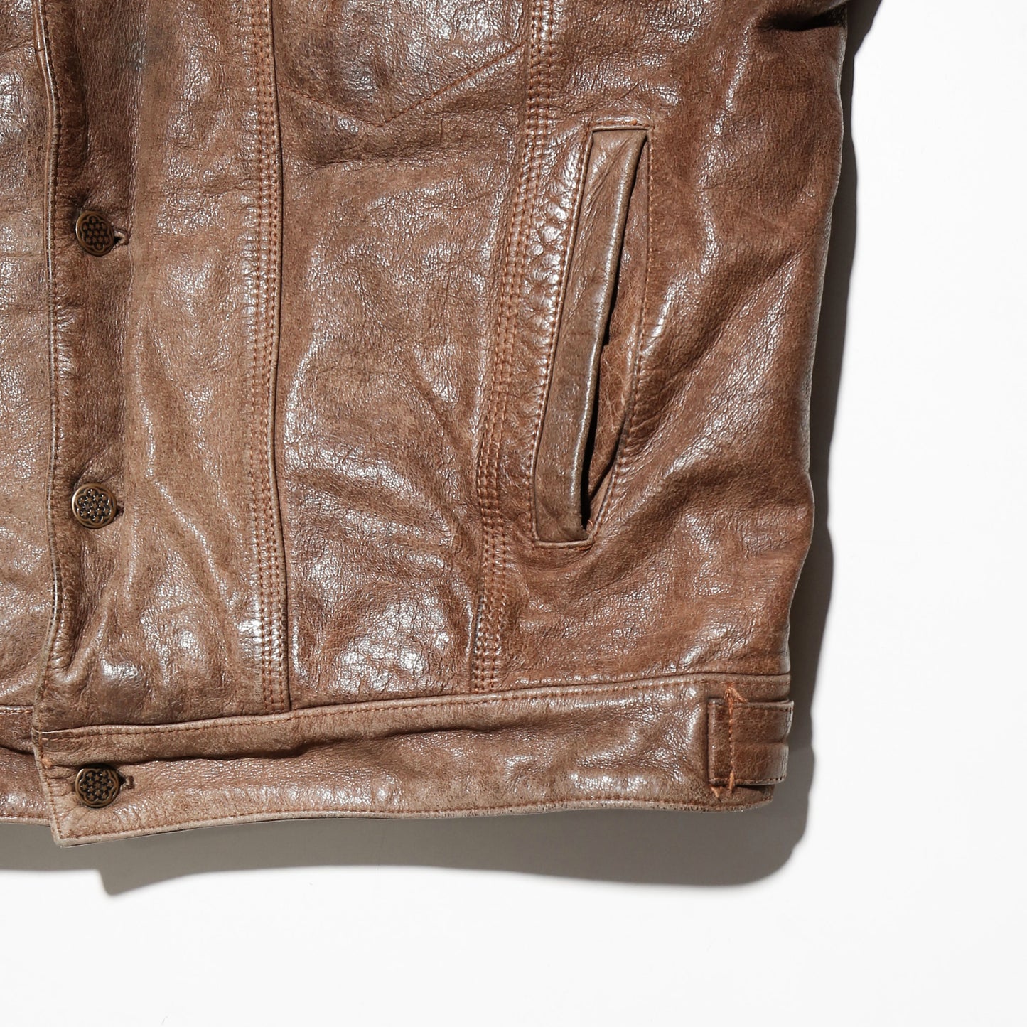 vintage faded leather trucker jacket , with aging kapper badge