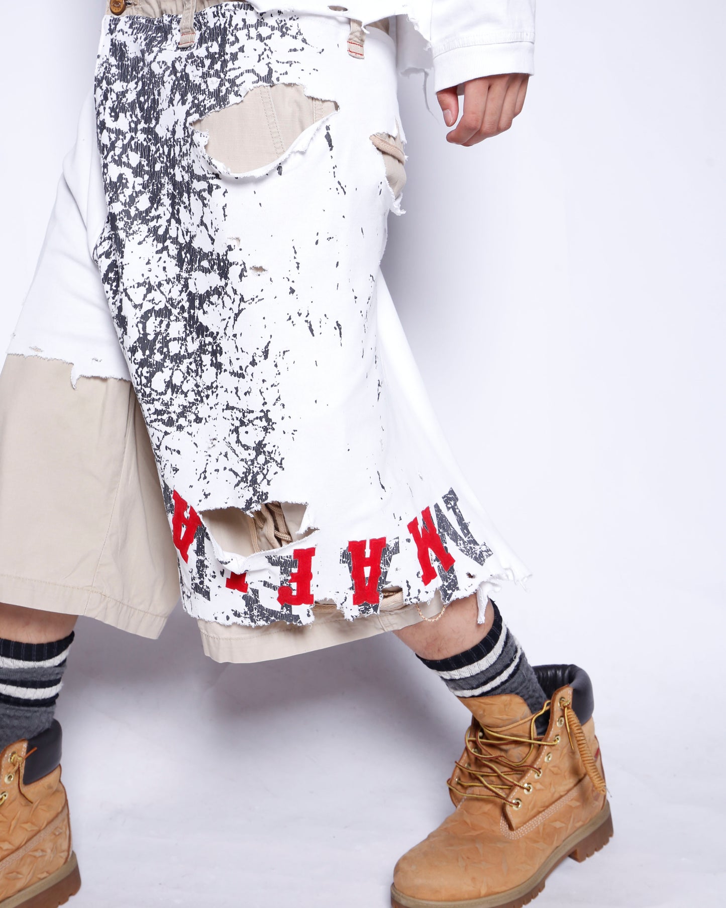 *one-off broken layered trousers