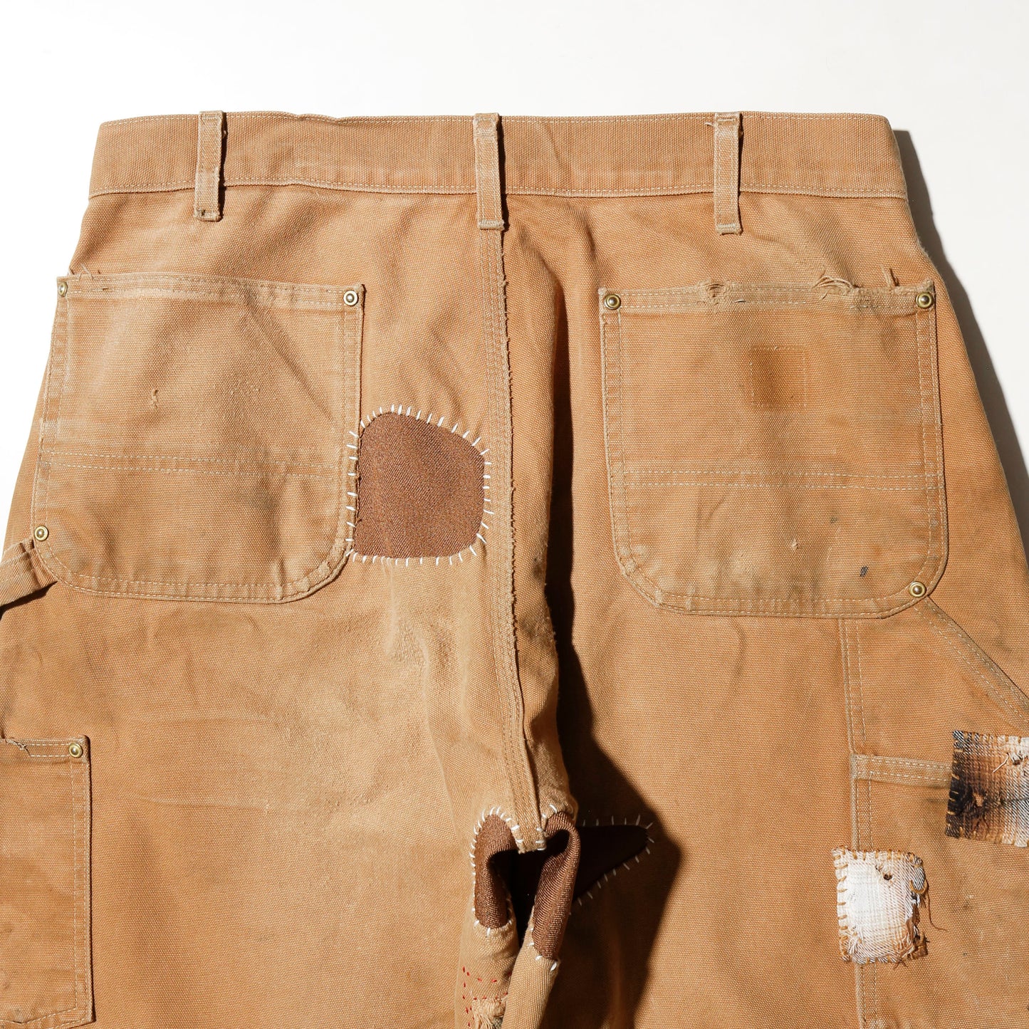 *one-off repaired double knee trousers, *hand crane stitched