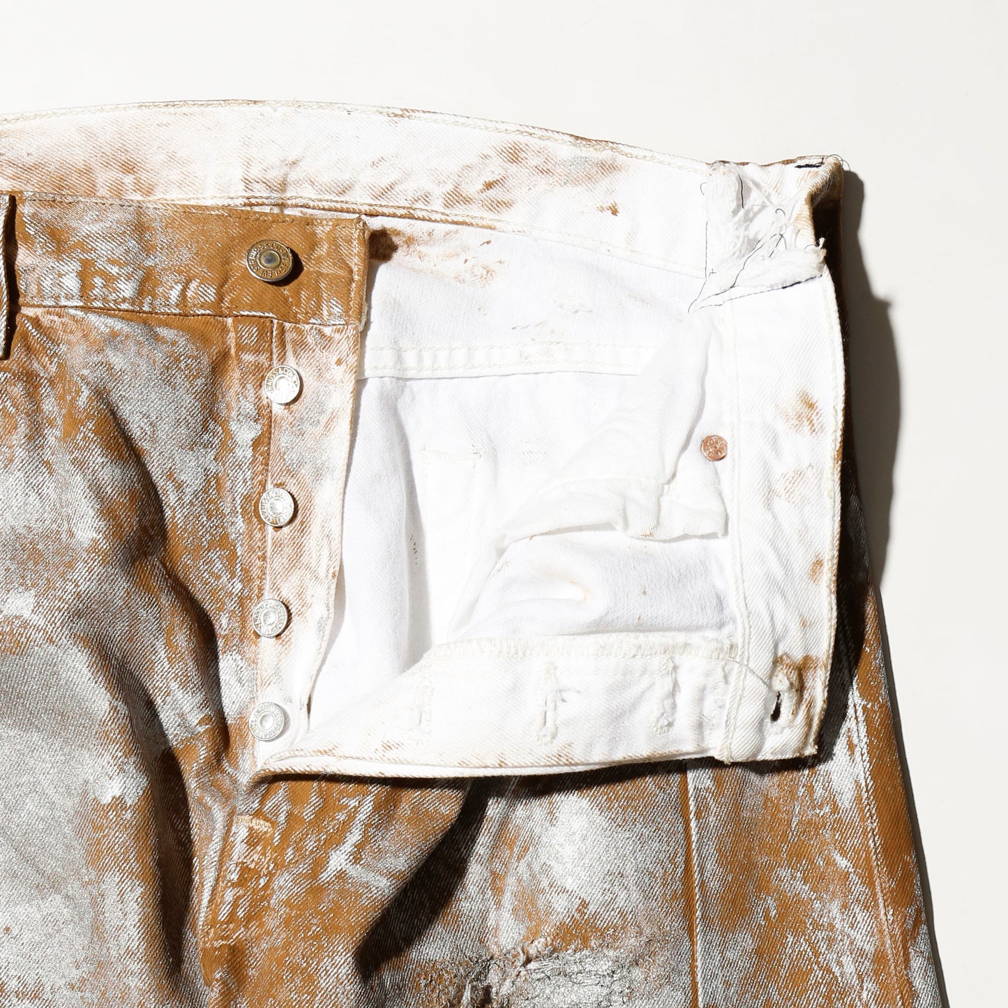 *one-off broken upside down jeans: model- silver dust camel
