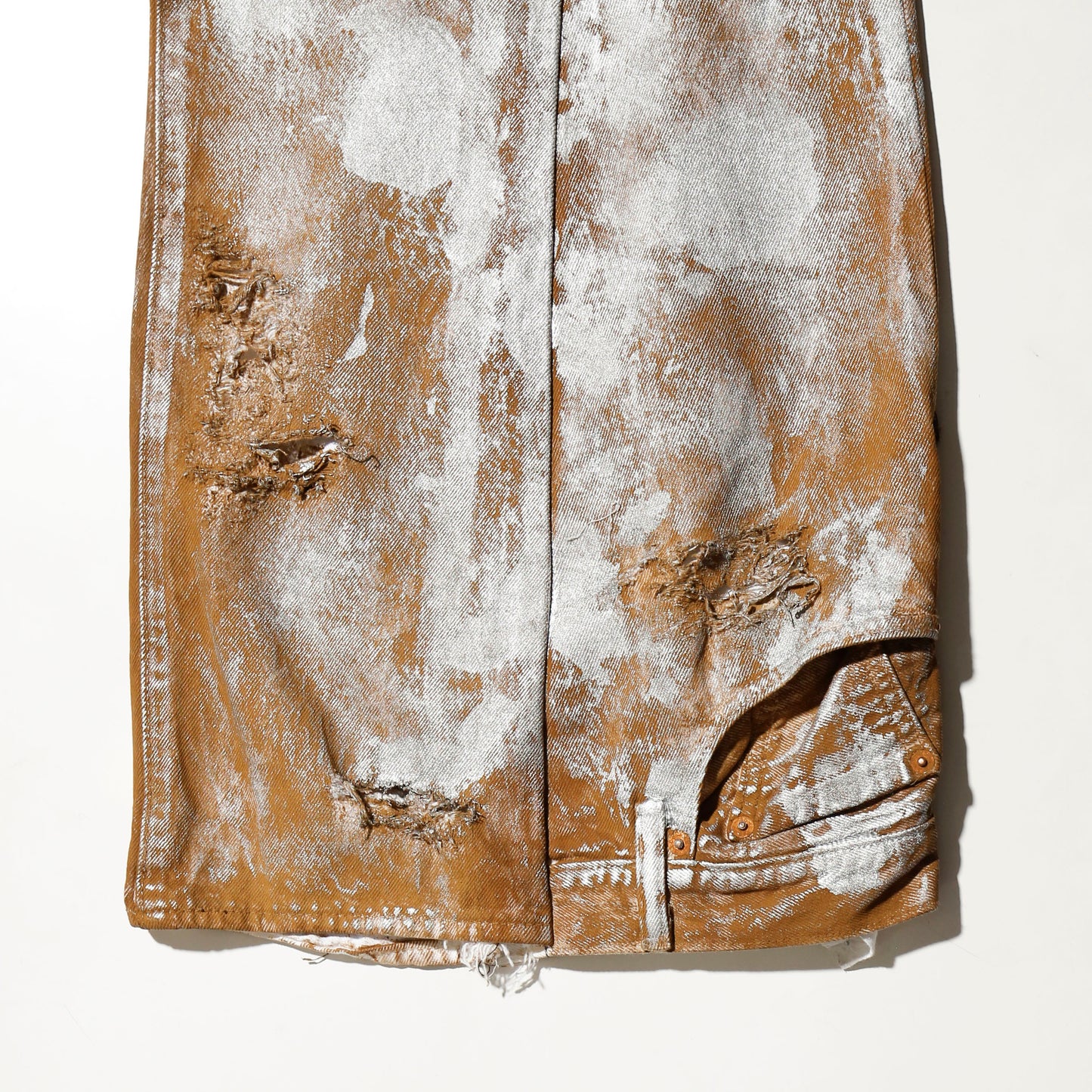 *one-off broken upside down jeans: model- silver dust camel