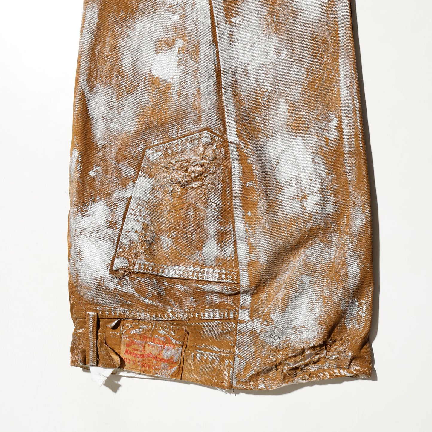 *one-off broken upside down jeans: model- silver dust camel