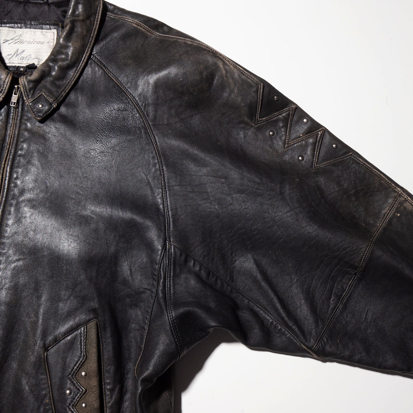 vintage studs fade leather jacket
