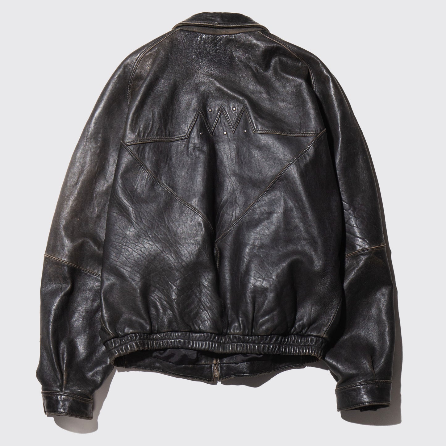 vintage studs fade leather jacket