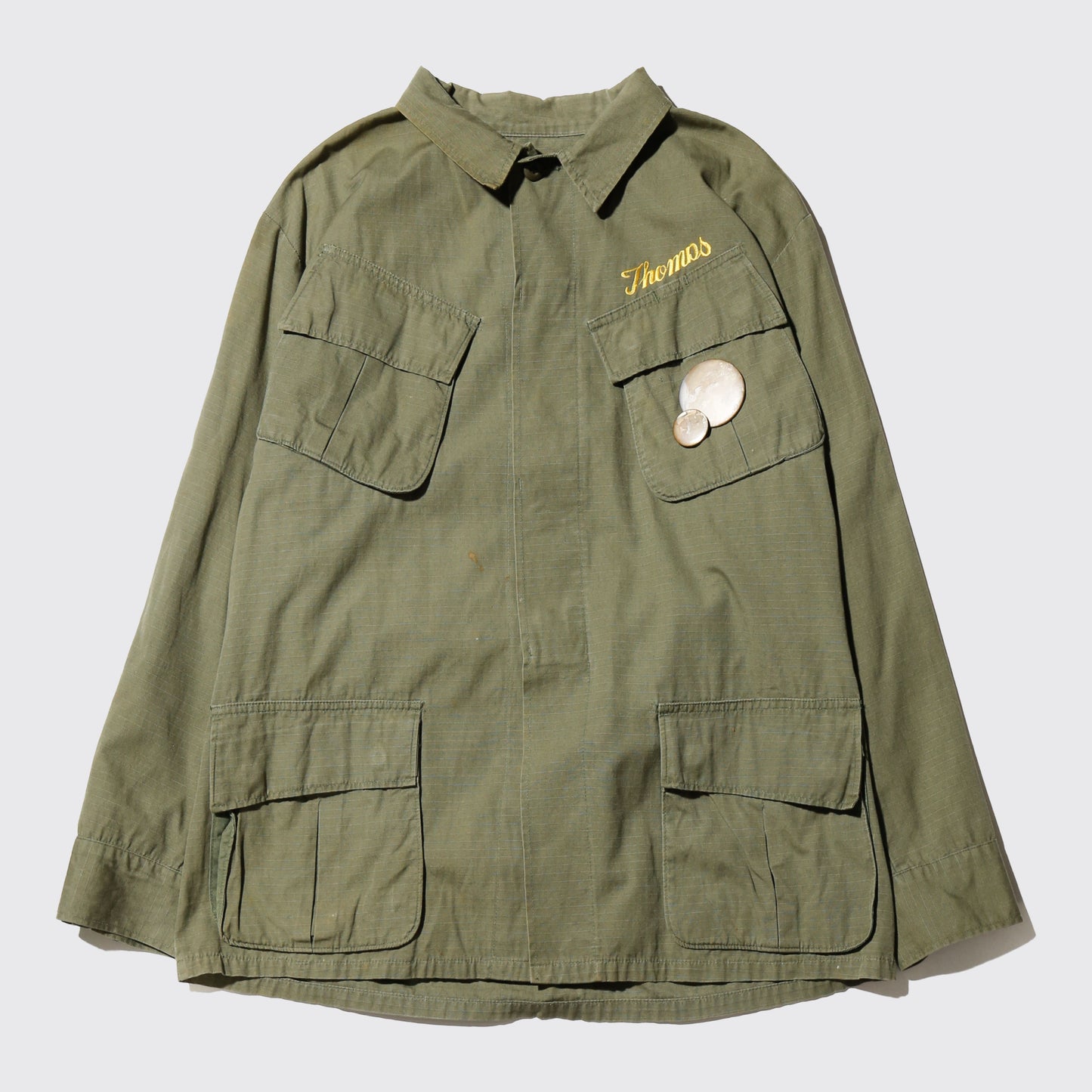 vintage 60's us army "Scriptures" broderied jungle fatigue jacket, with copper badge
