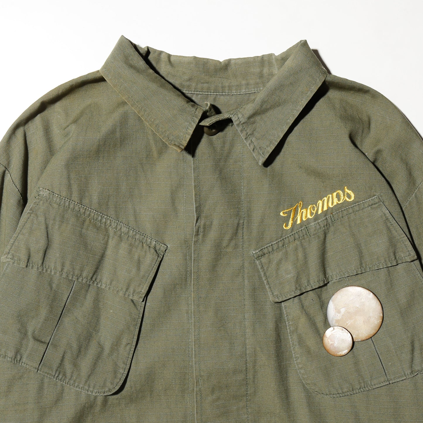 vintage 60's us army "Scriptures" broderied jungle fatigue jacket, with copper badge