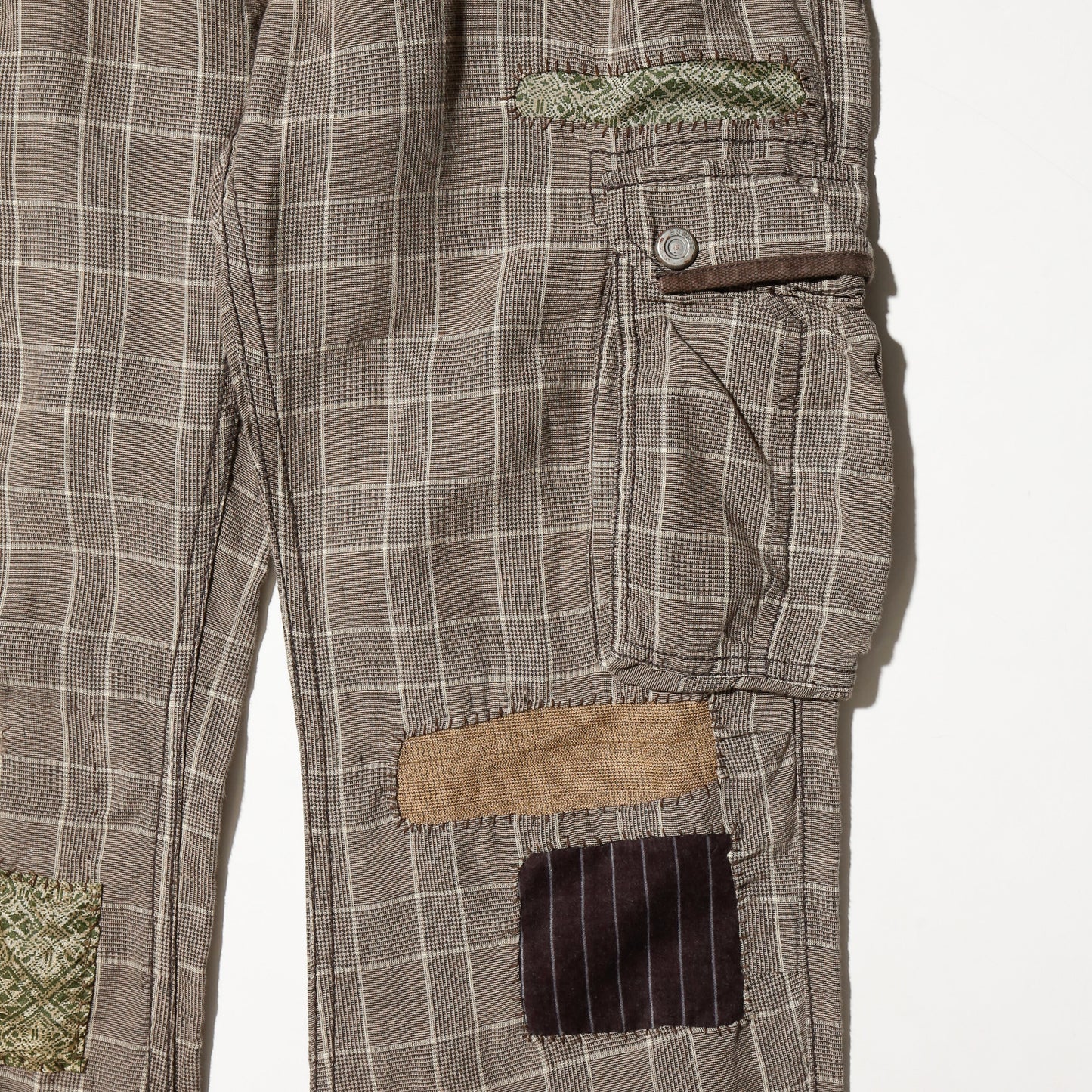 *one-off esplit repaired check cargo trousers