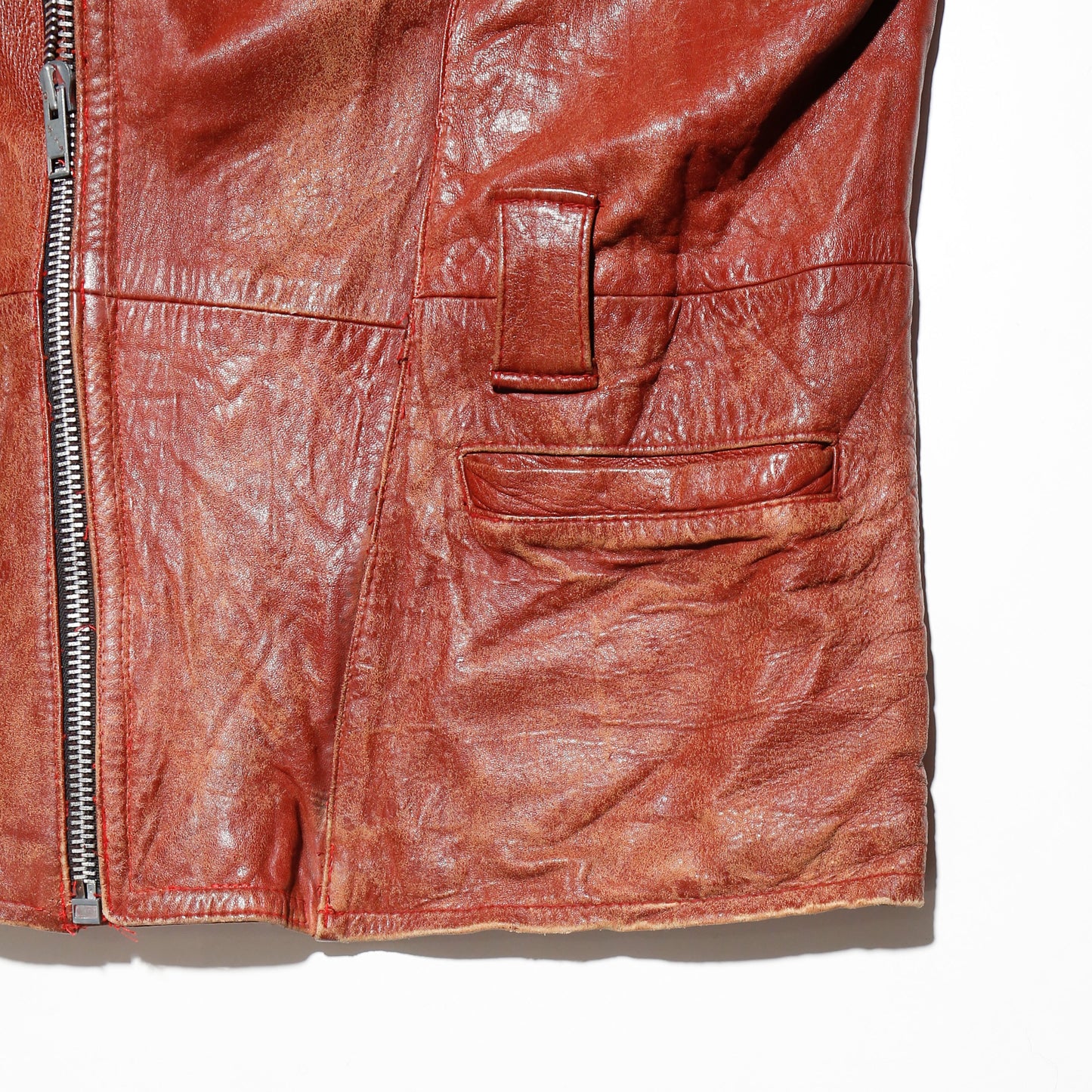 vintage reddish leather riders jacket , with badge