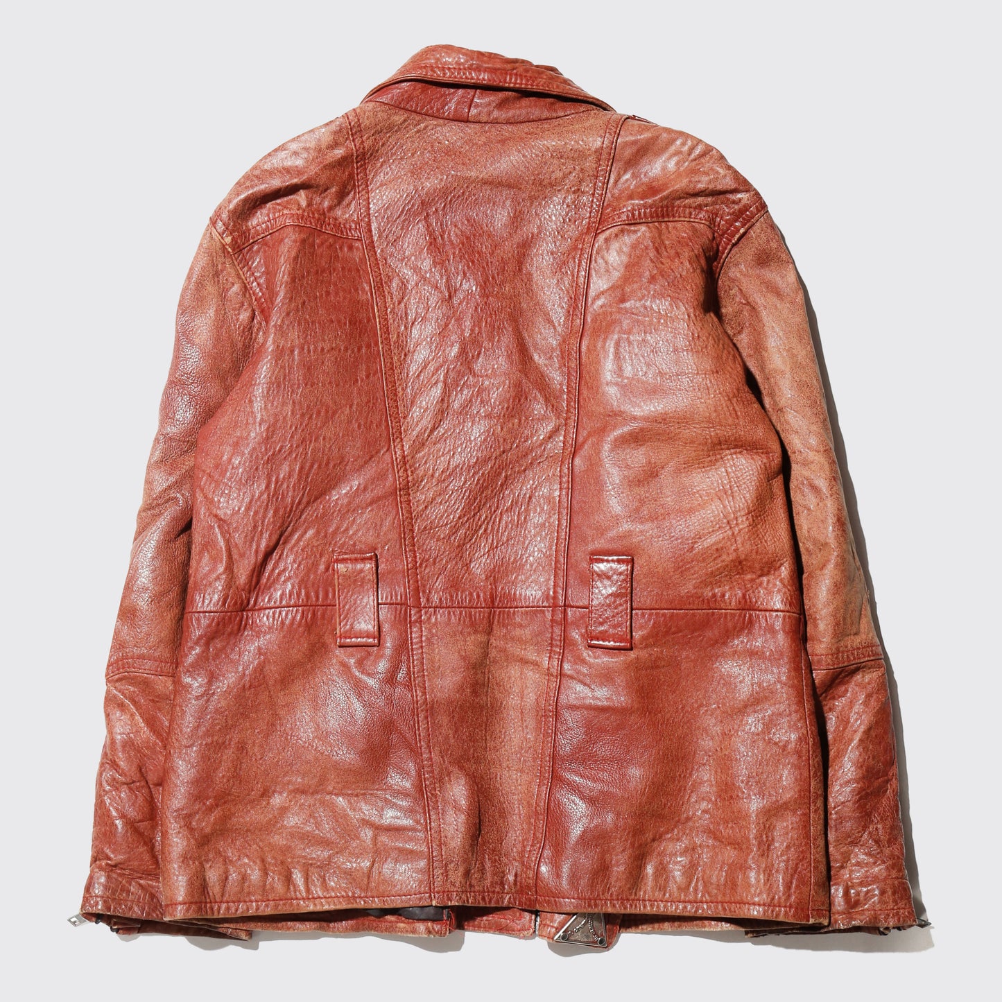vintage reddish leather riders jacket , with badge